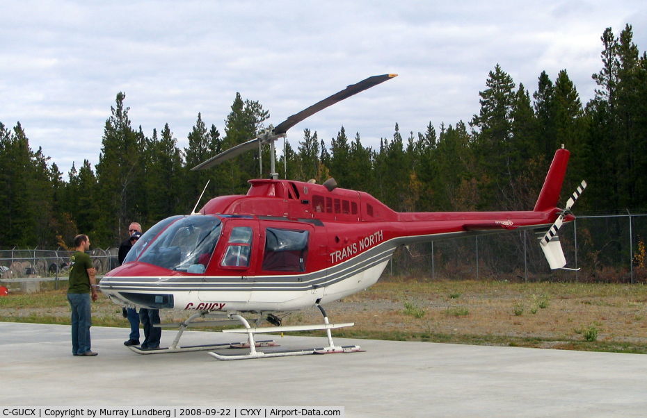 C-GUCX, 1975 Bell 206B JetRanger II C/N 1781, Loading passengers at the Trans North yard in Whitehorse, Yukon.