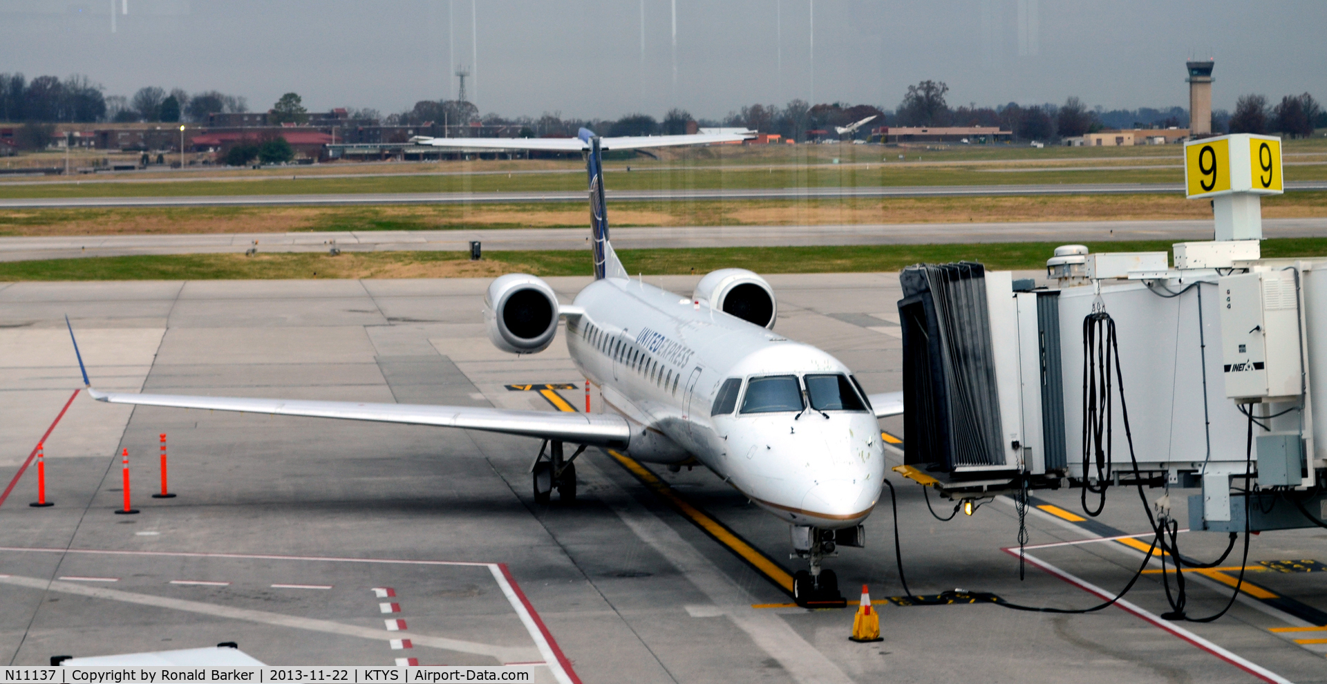 N11137, 2003 Embraer ERJ-145XR (EMB-145XR) C/N 145721, Gate 9  TYS
