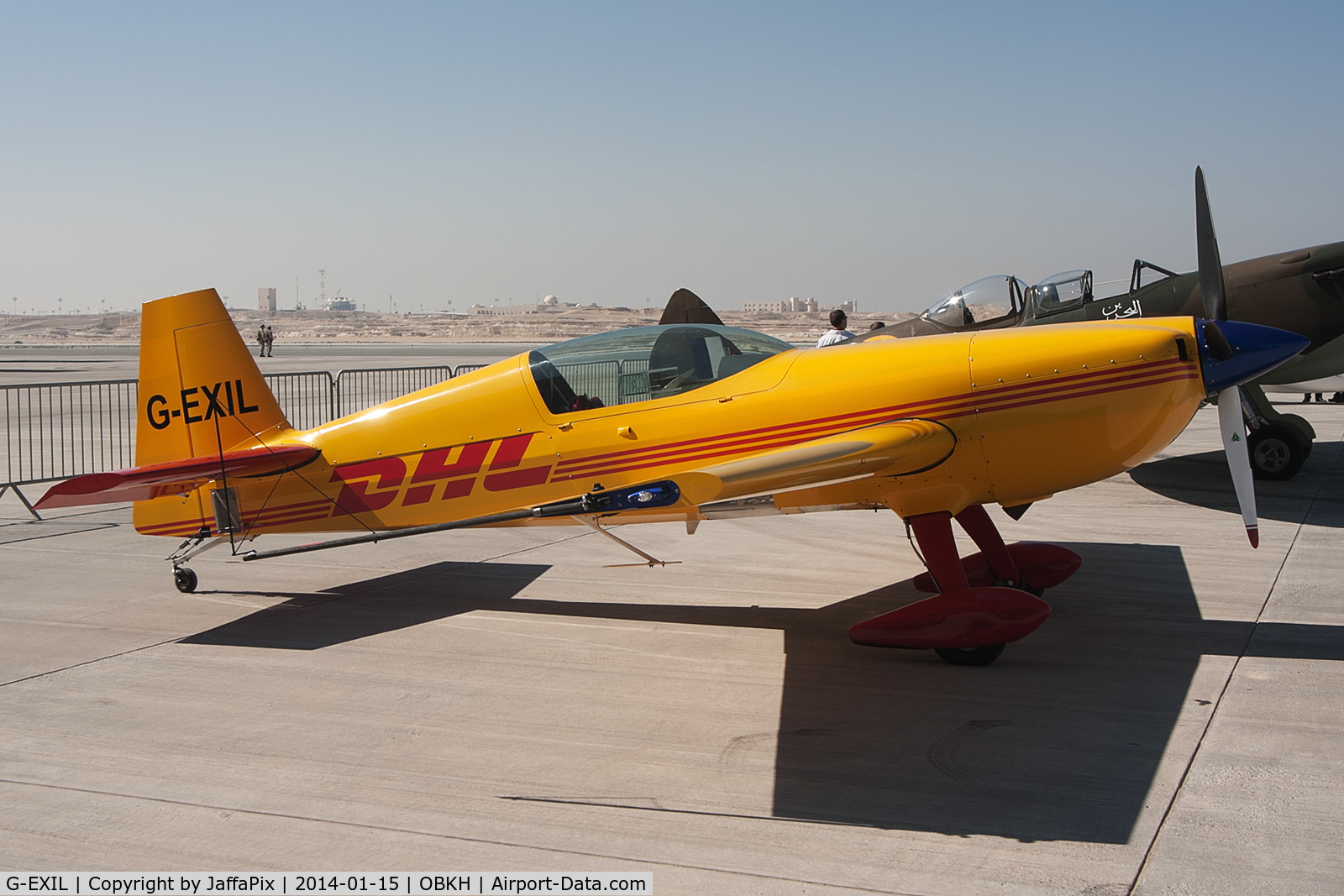 G-EXIL, 2010 Extra EA-300S C/N 1036, Now in DHL colours for the 2014 season