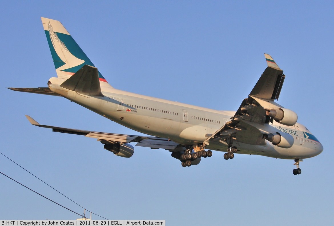B-HKT, 1992 Boeing 747-412 C/N 27132, Across the A30 for a dawn touchdown