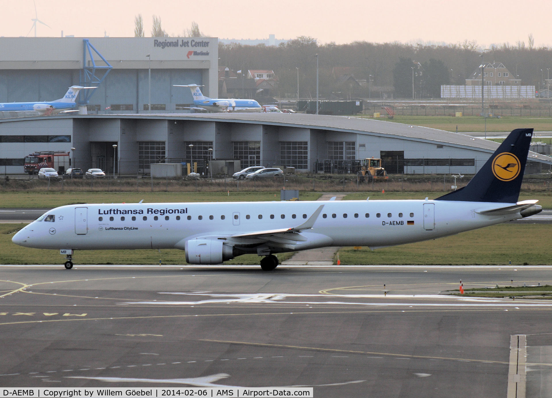 D-AEMB, 2009 Embraer 195LR (ERJ-190-200LR) C/N 19000297, Taxi to runway 18L of Schiphol Airport in L.H  outfit