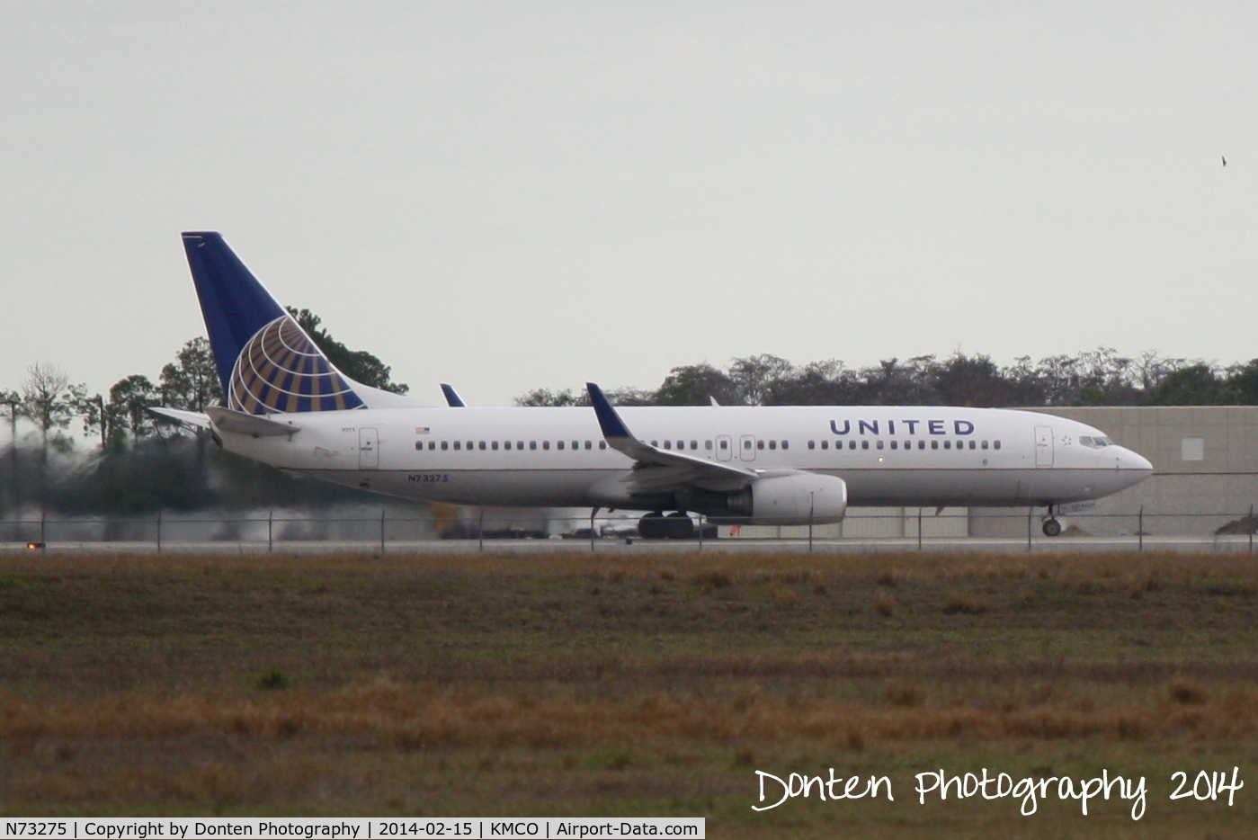 N73275, 2002 Boeing 737-824 C/N 31593, United Flght 1475 (N73275) departs Orlando Internatonal Airport enroute to Denver International Airport