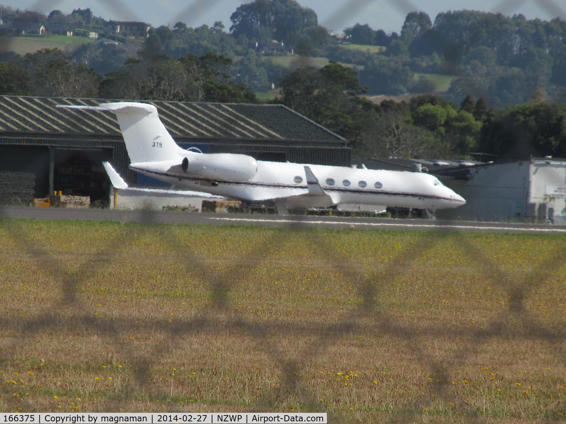 166375, Gulfstream Aerospace C-37A (Gulfstream V) C/N 657, shame about fence but I am not 7ft tall!!