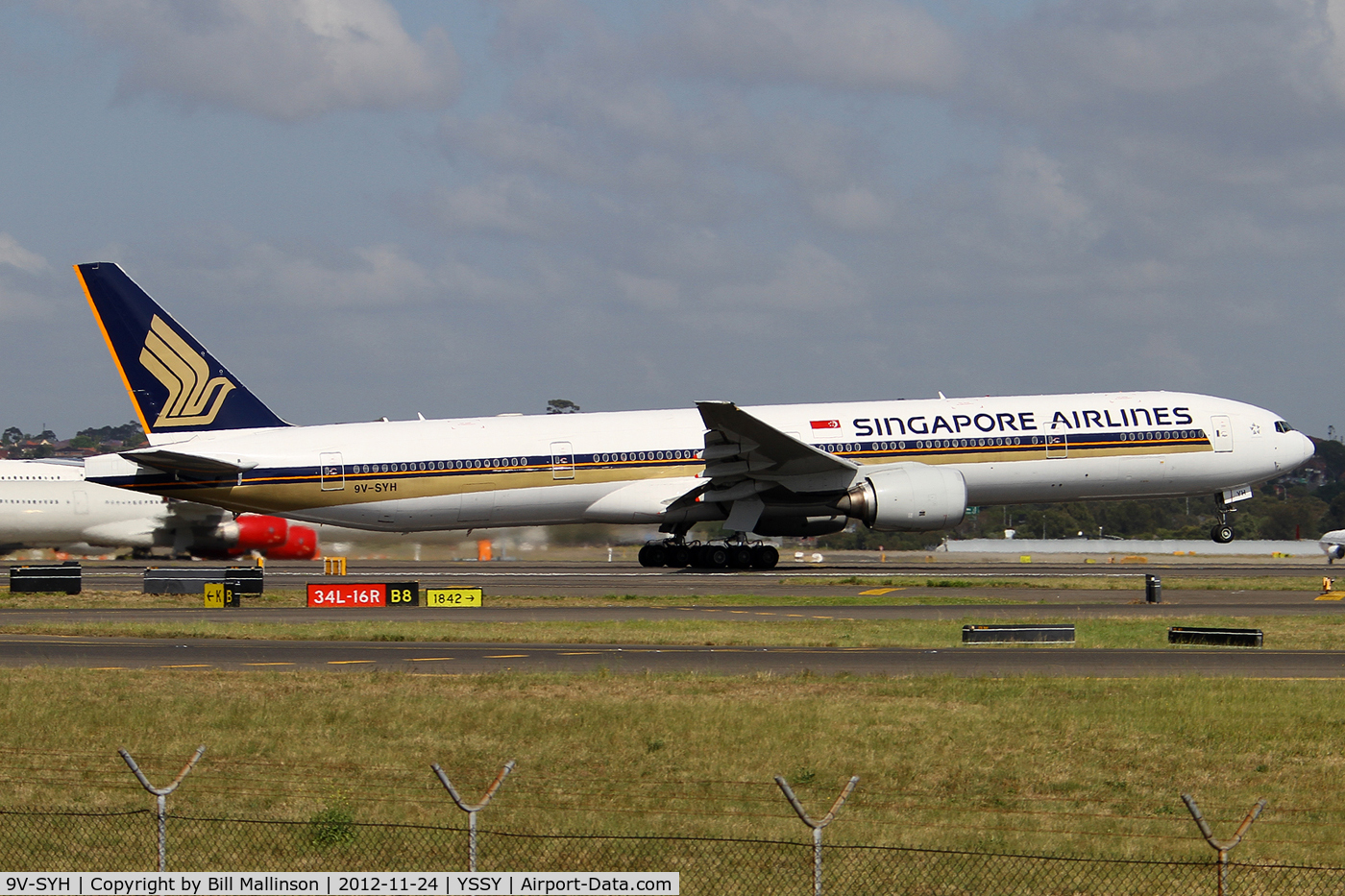 9V-SYH, 2002 Boeing 777-312 C/N 32317, rotating from 34L to SIN