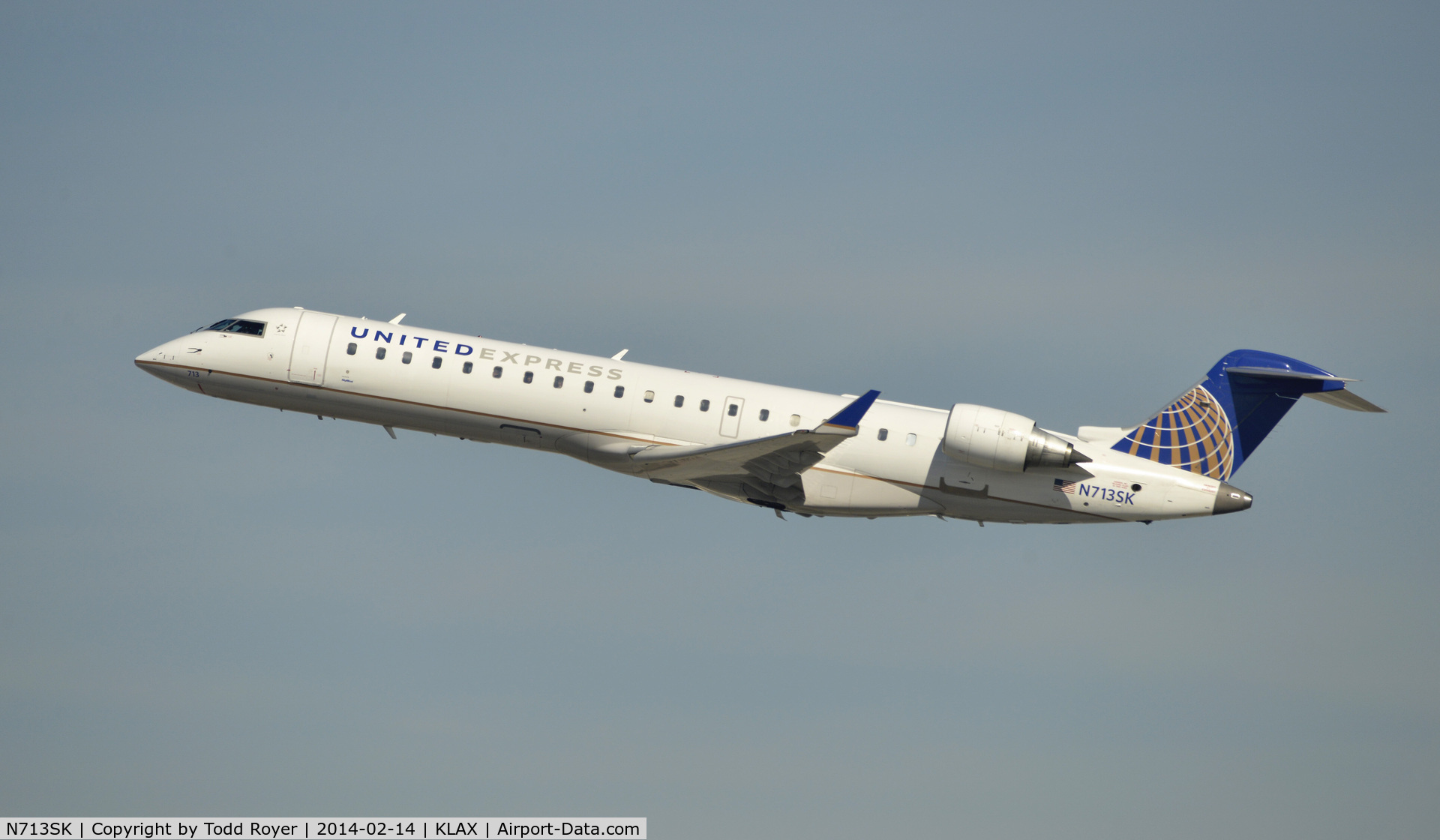 N713SK, 2004 Bombardier CRJ-701ER (CL-600-2C10) Regional Jet C/N 10174, Departing LAX on 25R