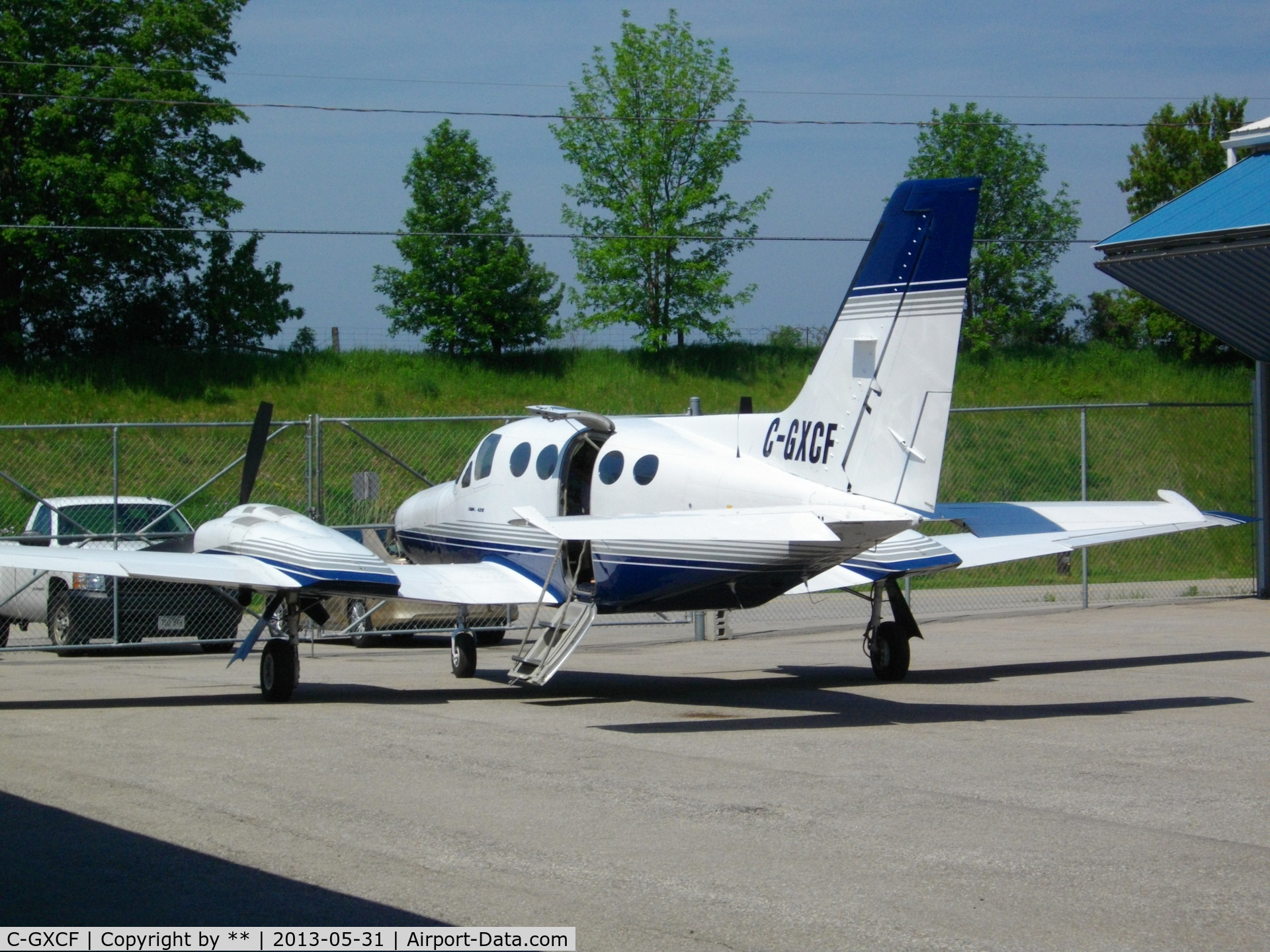 C-GXCF, 1976 Cessna 421C Golden Eagle C/N 421C0083, Parked at CYKF