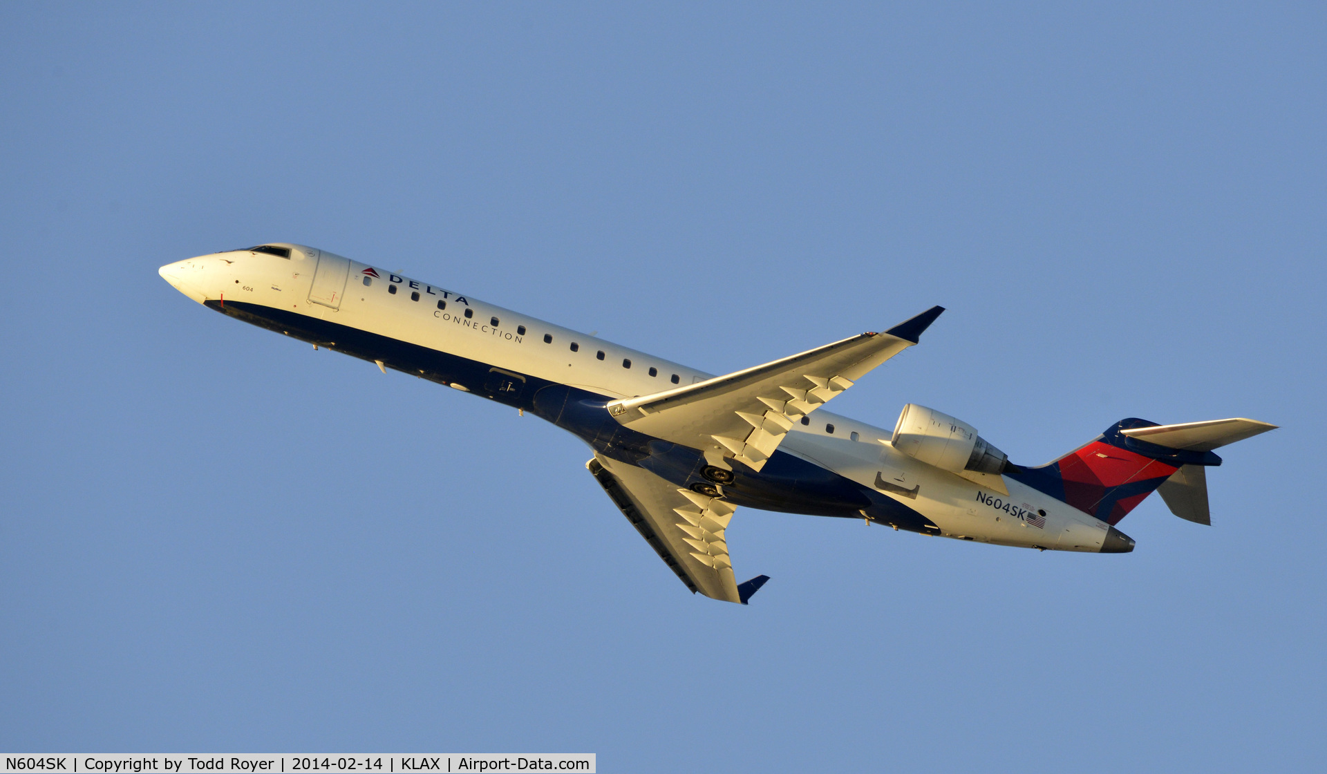 N604SK, 2006 Bombardier CRJ-702 (CL-600-2C10) Regional Jet C/N 10249, Departing LAX on 25R