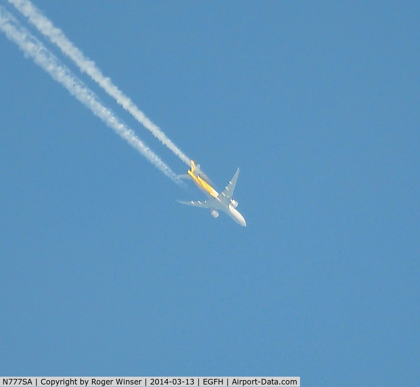 N777SA, 2012 Boeing 777-FZB C/N 37989, B777 operated by Southern Air/DHL Cargo flying east at 35000 feet over Swansea Airport.