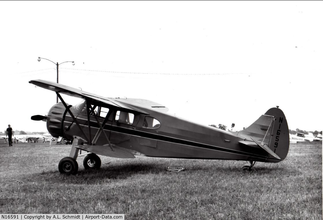 N16591, 1936 Waco EQC-6 C/N 4490, This photo, taken by my dad, A.L. Schmidt, is undated. Estimated 1985. Unknown airport/field - perhaps at EAA.