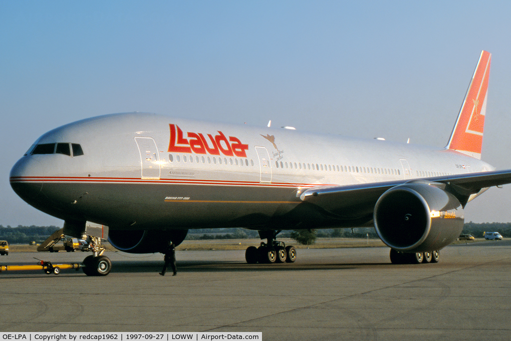 OE-LPA, 1997 Boeing 777-2Z9/ER C/N 28698, Press presentation with Mr. Lauda in the cockpit. Towed in in front of the AUA-Hangar.