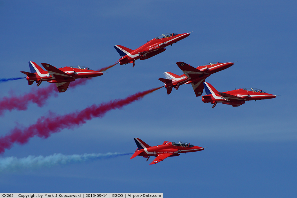 XX263, 1978 Hawker Siddeley Hawk T.1A C/N 099/312099, Taken at the 2013 Southport Airshow (UK) in close formation with other aircraft of the RAF Red Arrows aerobatic display team.