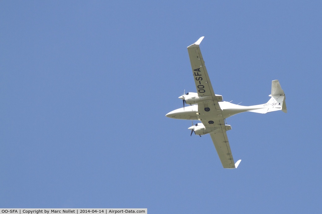 OO-SFA, 2007 Diamond DA-42 Twin Star C/N 42.340, Picture taken on 14/04/14 at 14:53. OO-SFA is approaching the airport of Ostend (Belgium)