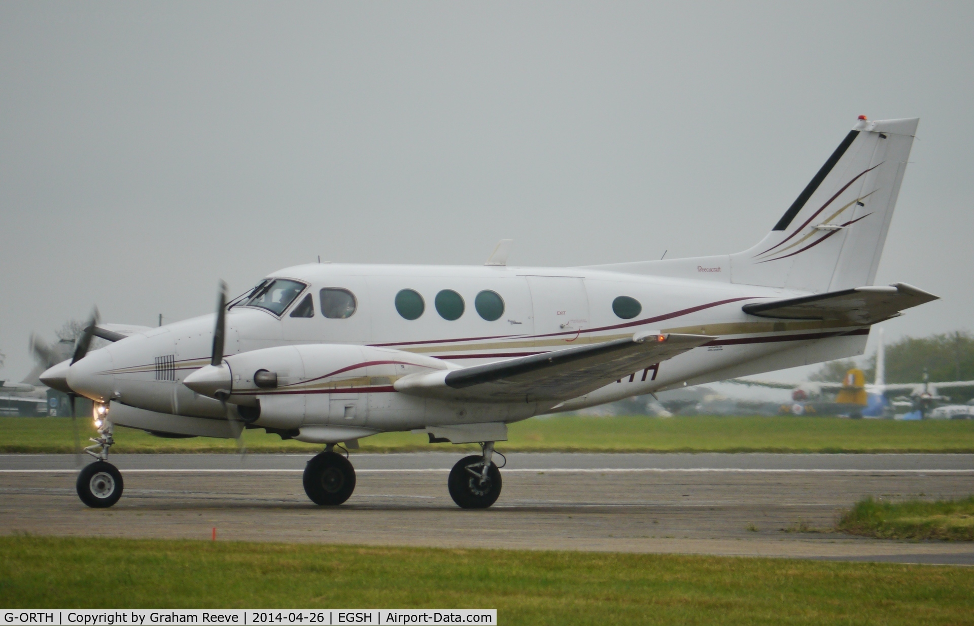 G-ORTH, 1975 Beech E90 King Air C/N LW-136, About to depart.