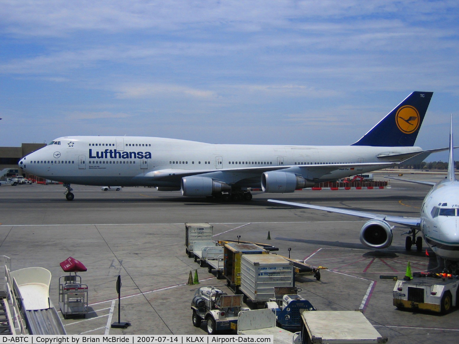 D-ABTC, 1990 Boeing 747-430M C/N 24287, Lufthansa. 747-430M. D-ABTC cn 24287 754. Alaska 737-4Q8 N785AS to her right. Los Angeles - International (LAX KLAX). Image © Brian McBride. 14 July 2007