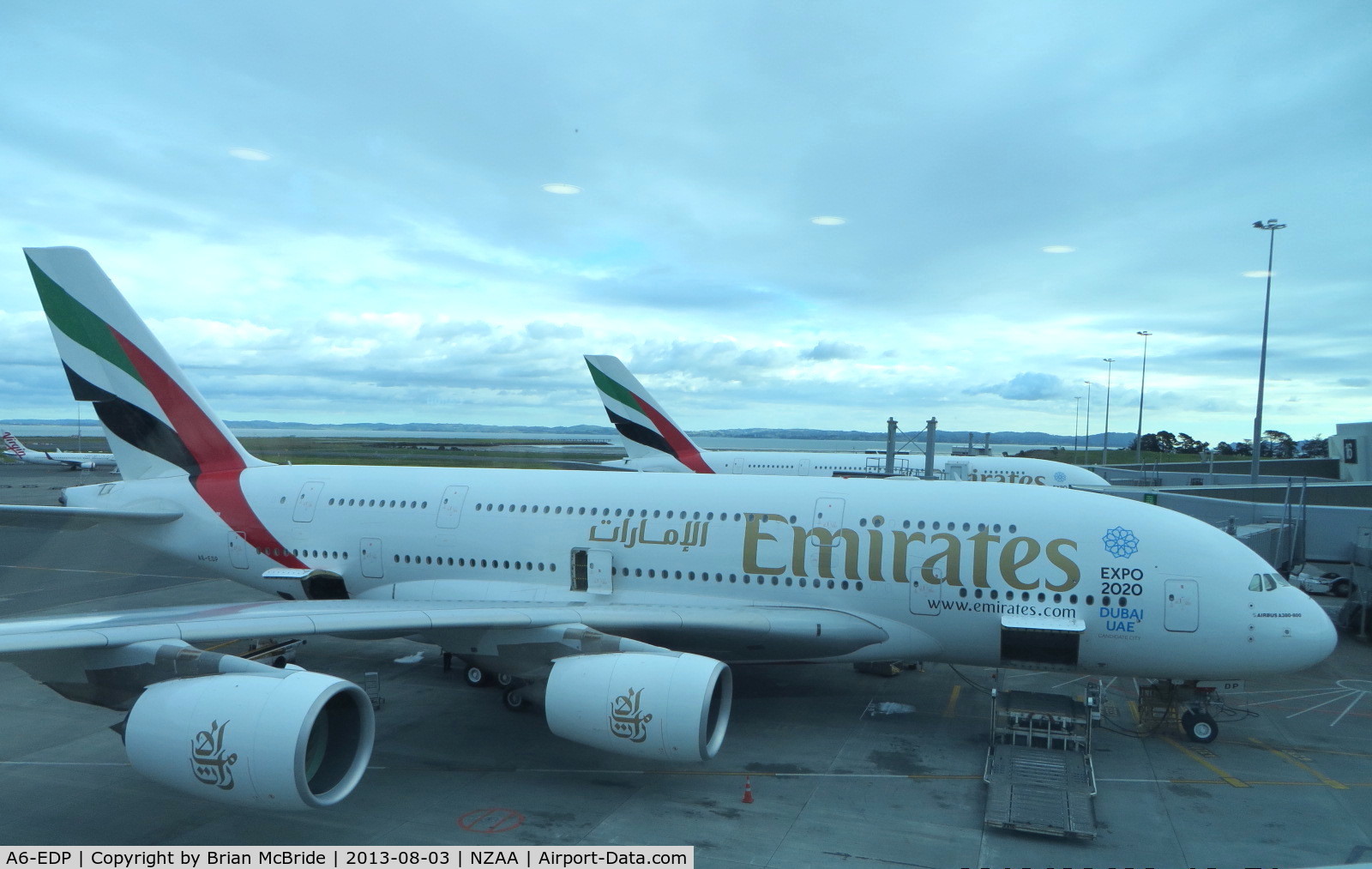 A6-EDP, 2011 Airbus A380-861 C/N 077, Emirates. A380-861. A6-EDP cn 077. Sister Ship A6-EDE behind her. Auckland - International (AKL NZAA). Image © Brian McBride. 03 August 2013