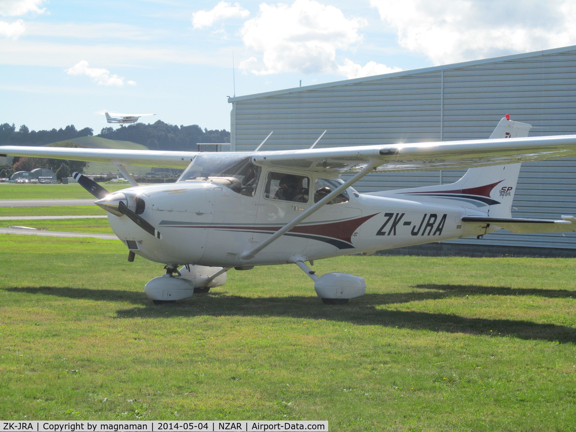 ZK-JRA, Cessna 172S C/N 172S9767, On flying club grass by café - great fruit smoothies!!