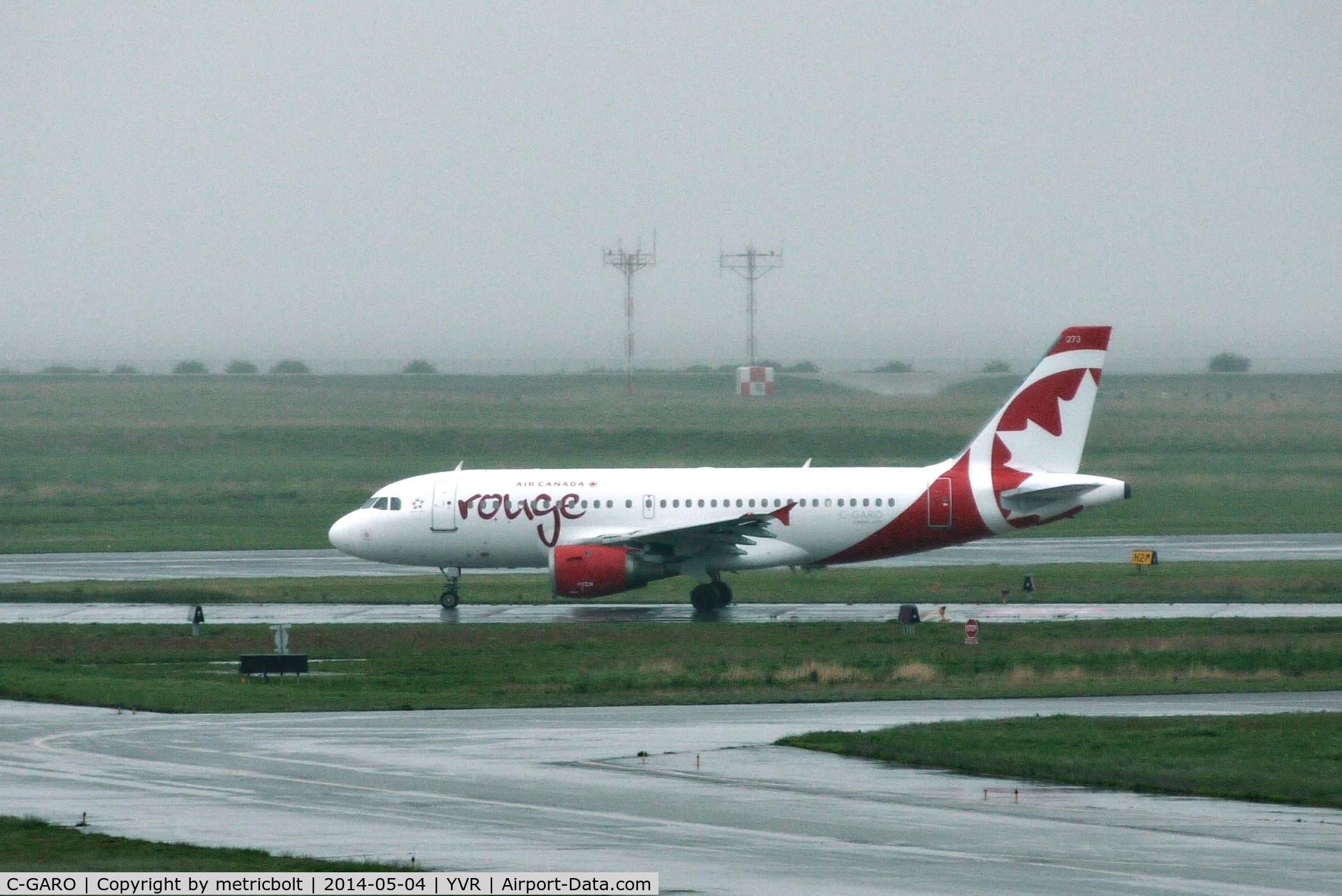 C-GARO, 1997 Airbus A319-114 C/N 757, Departure on a wet,rainy day