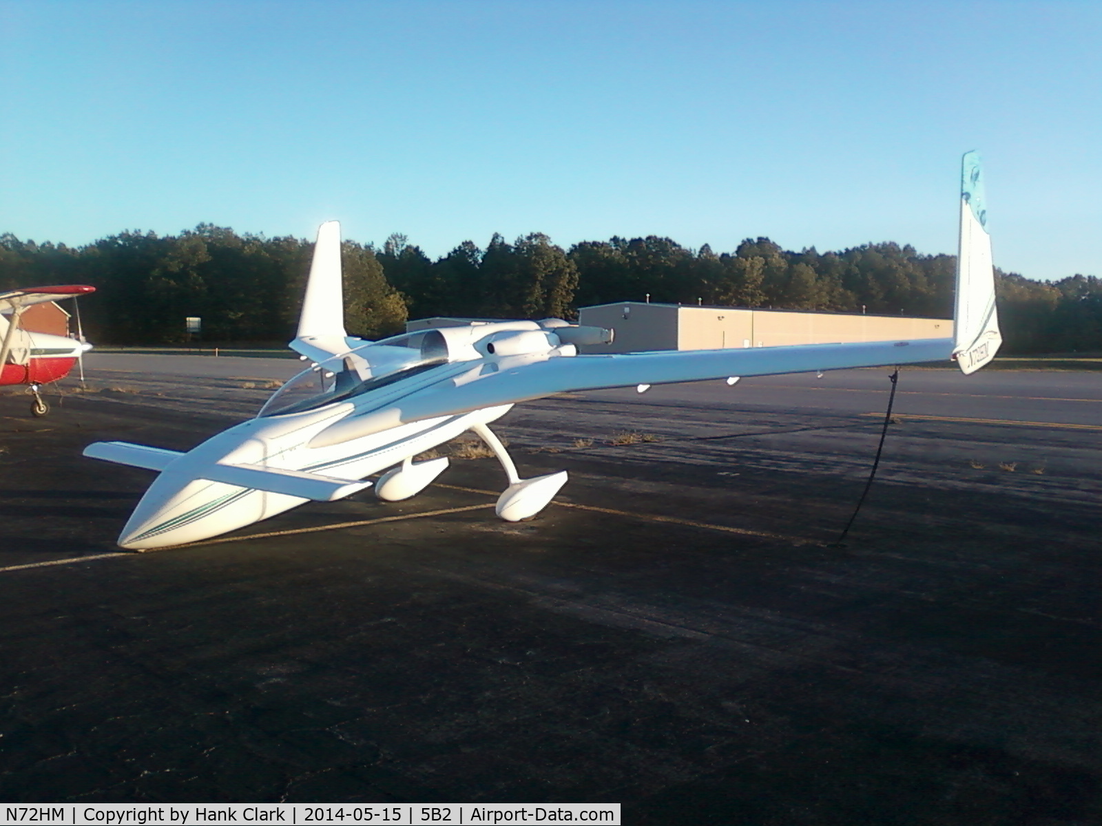 N72HM, Rutan Long-EZ C/N 72, Parked on her nose...  A small price to pay for 140 mph cruise burning 5.0 gal/hr.
