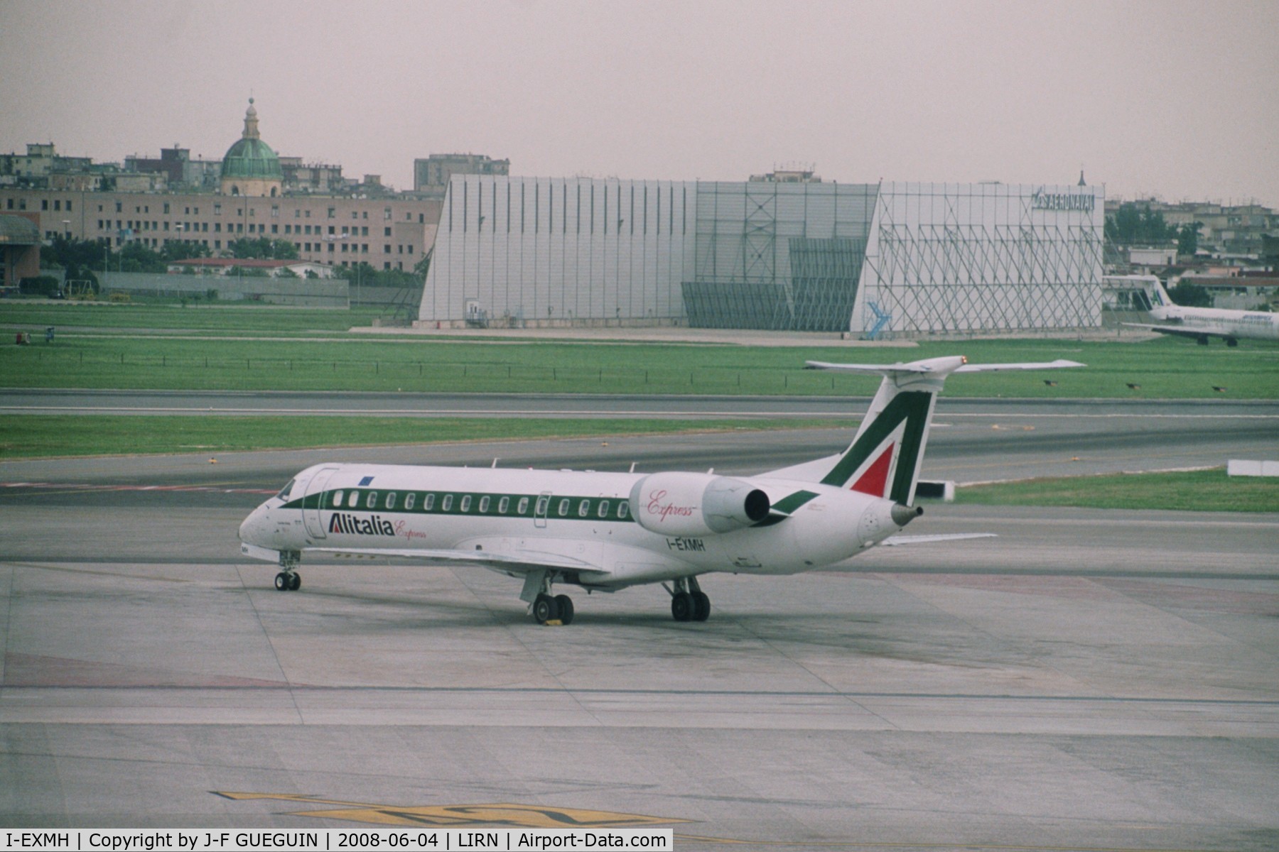 I-EXMH, 2002 Embraer ERJ-145LR (EMB-145LR) C/N 145665, I-EXMH waiting at Naples-Capodichino.