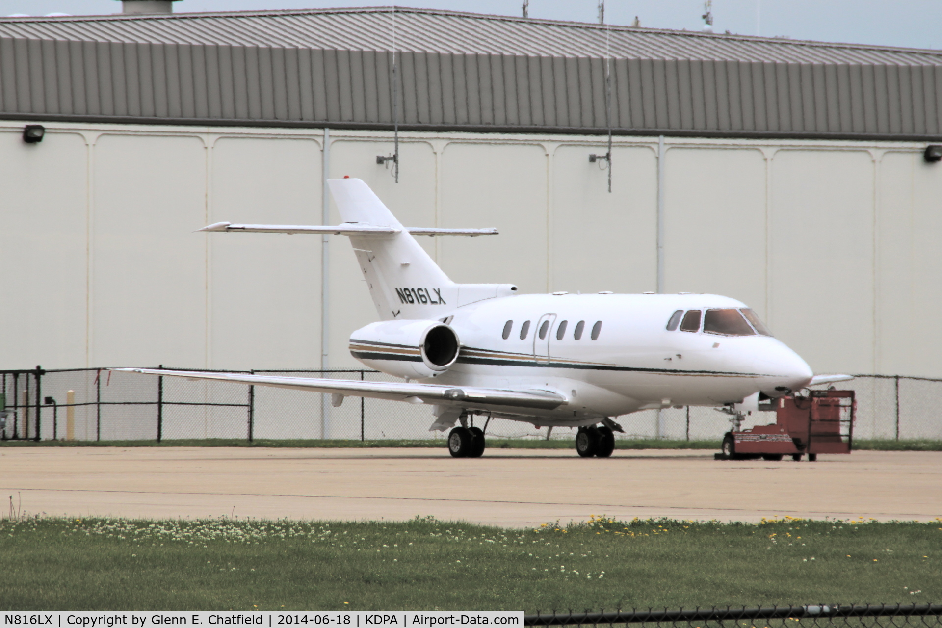 N816LX, 1998 Raytheon Hawker 800XP C/N 258363, Had to stand on my bumper to get the shot