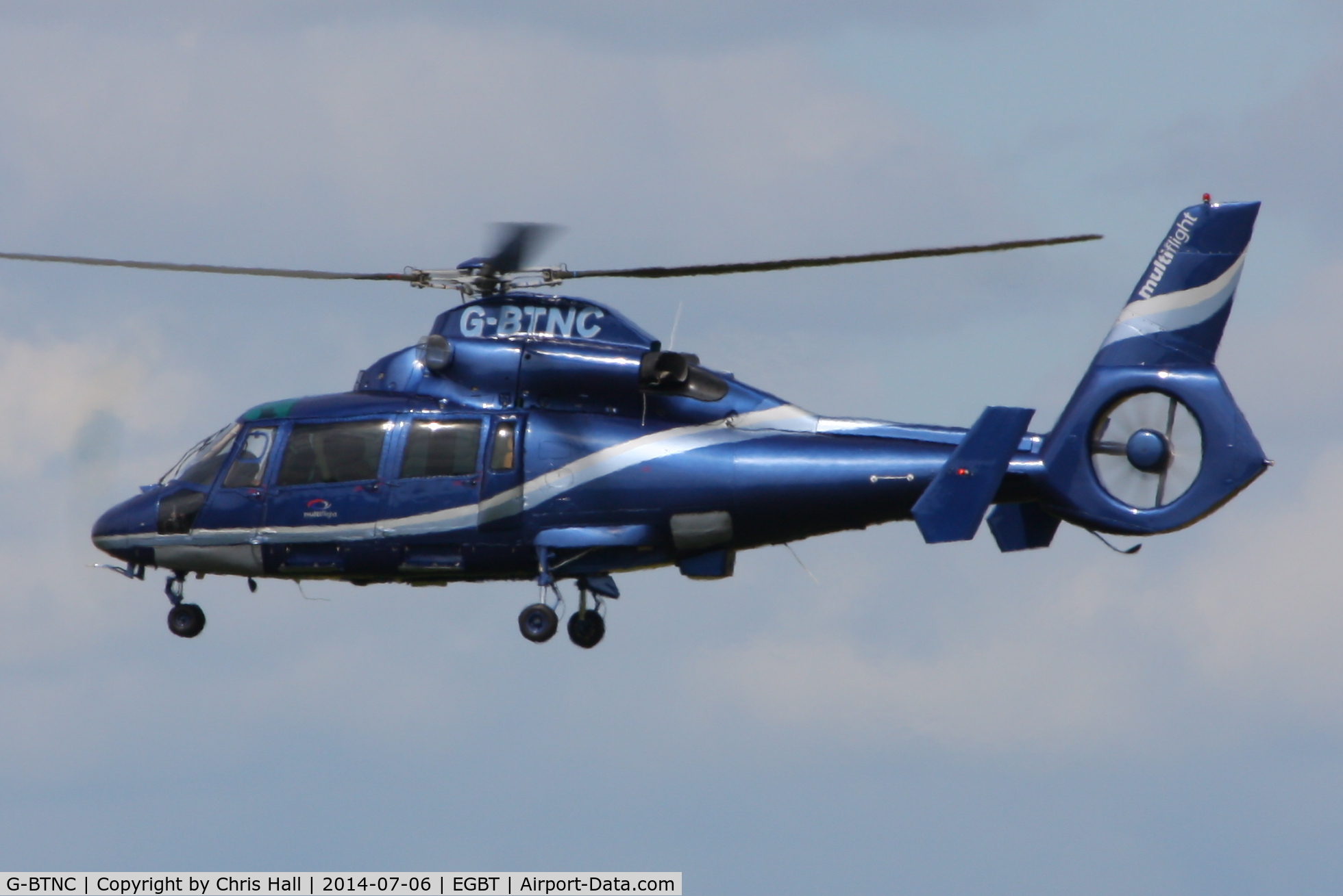 G-BTNC, 1991 Aerospatiale AS-365N-2 Dauphin C/N 6409, ferrying race fans to the British F1 Grand Prix at Silverstone