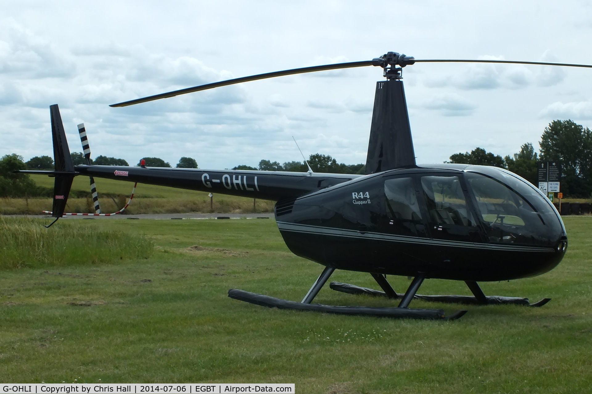 G-OHLI, 2005 Robinson R44 Clipper II C/N 10832, ferrying race fans to the British F1 Grand Prix at Silverstone