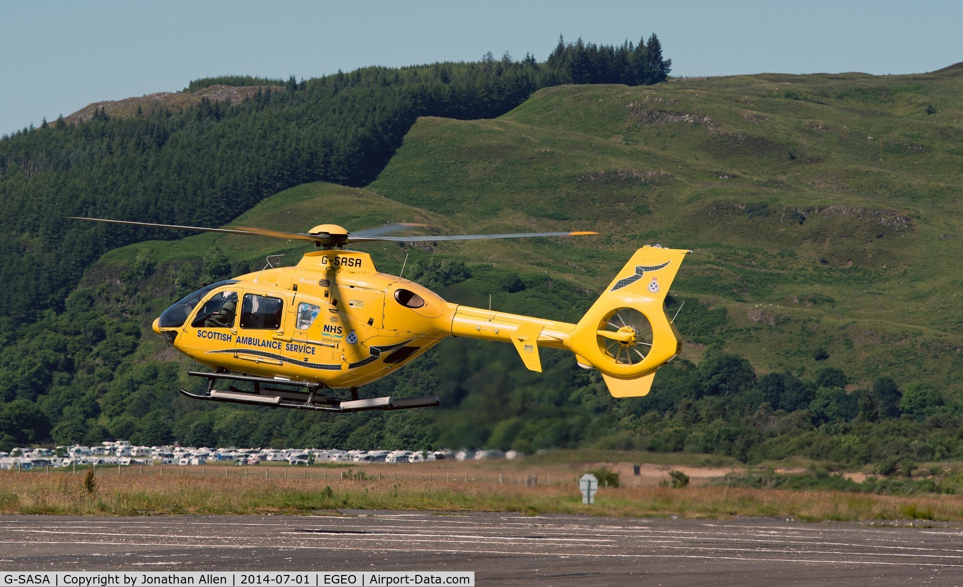 G-SASA, 2000 Eurocopter EC-135T-2 C/N 0147, Lifting-off from Oban Airport heading to Barra.
