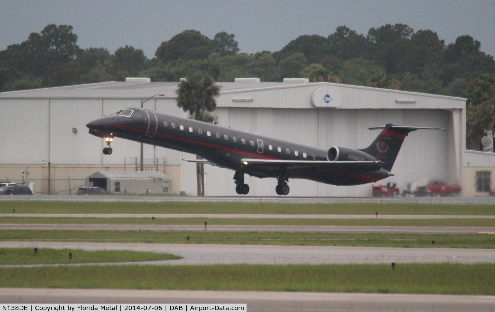 N138DE, 1999 Embraer EMB-145LU (ERJ-145LU) C/N 145129, Dale Earnhardt Inc E145 leaving Daytona after the Coke Zero 400 race