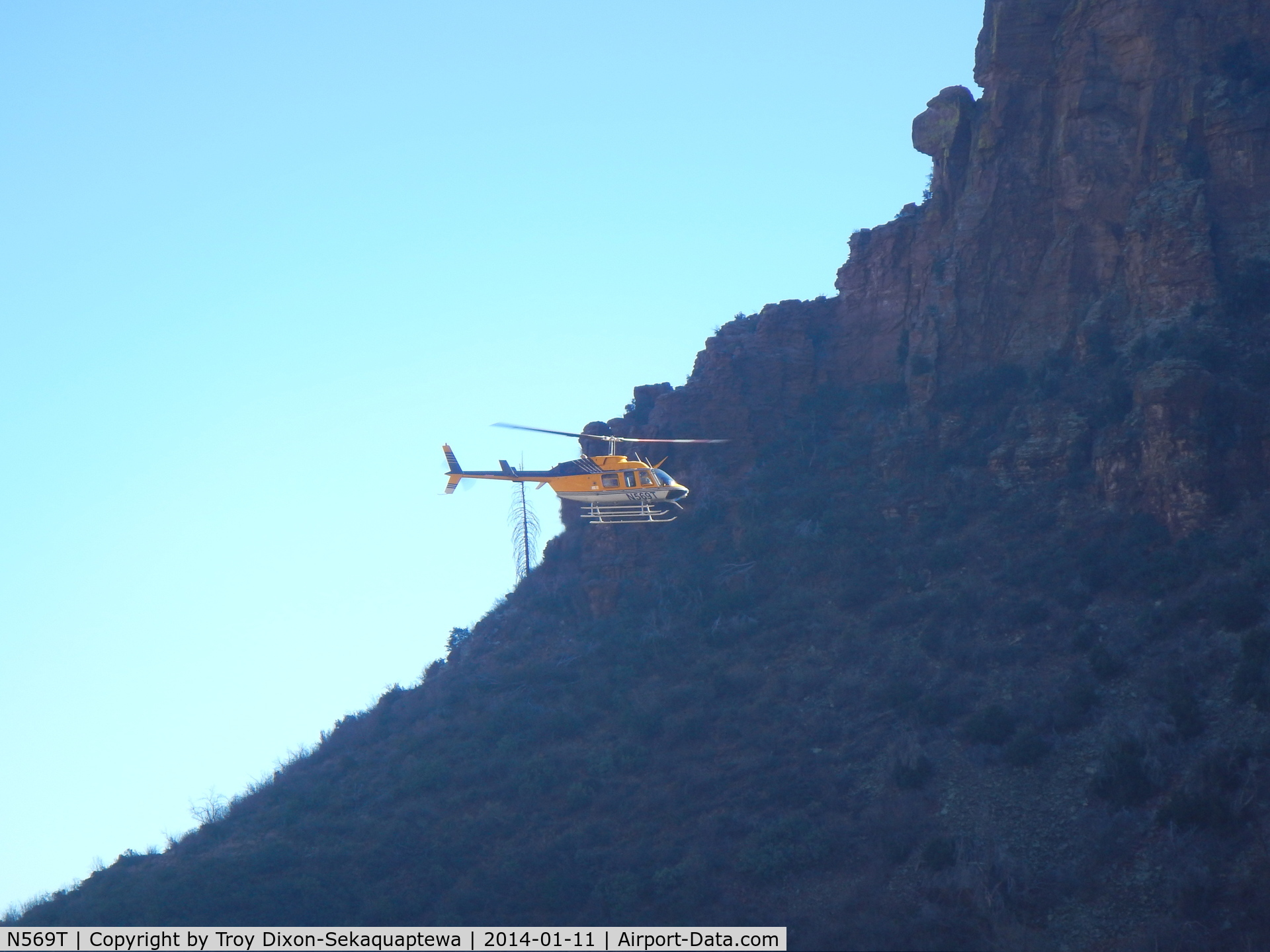 N569T, 2004 Bell 206L-4 LongRanger IV LongRanger C/N 52290, January of 2014 I was hiking to Indian ruins in Devil's Chasm canyon Arizona.  This Helicopter (N569T) flew through the canyon. I'm not sure who's view was better, theirs or ours.
