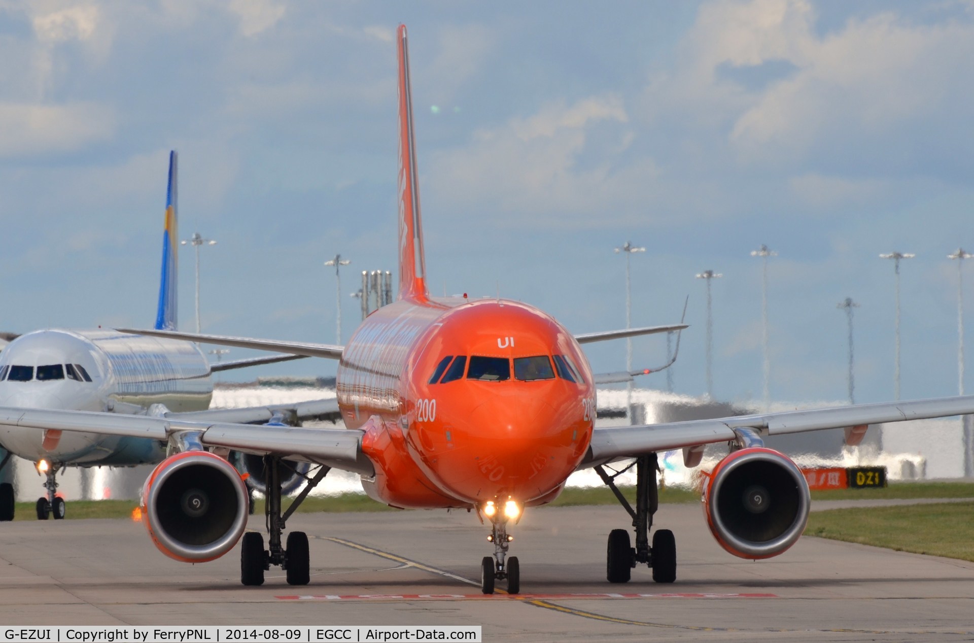G-EZUI, 2011 Airbus A320-214 C/N 4721, Orange A320 holding.