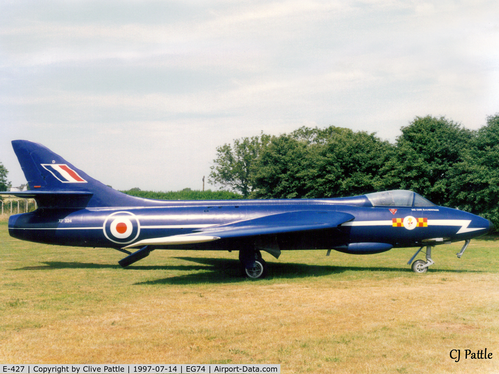 E-427, 1956 Hawker Hunter F-51 C/N 41H-680286, Scanned from print. Ex RDAF Hunter F.51 E-427 masquerading as RAF XF324 on gate guard duty at Bruntingthorpe (EG74. Now part of the 'Cold War Jets' collection at the same location.