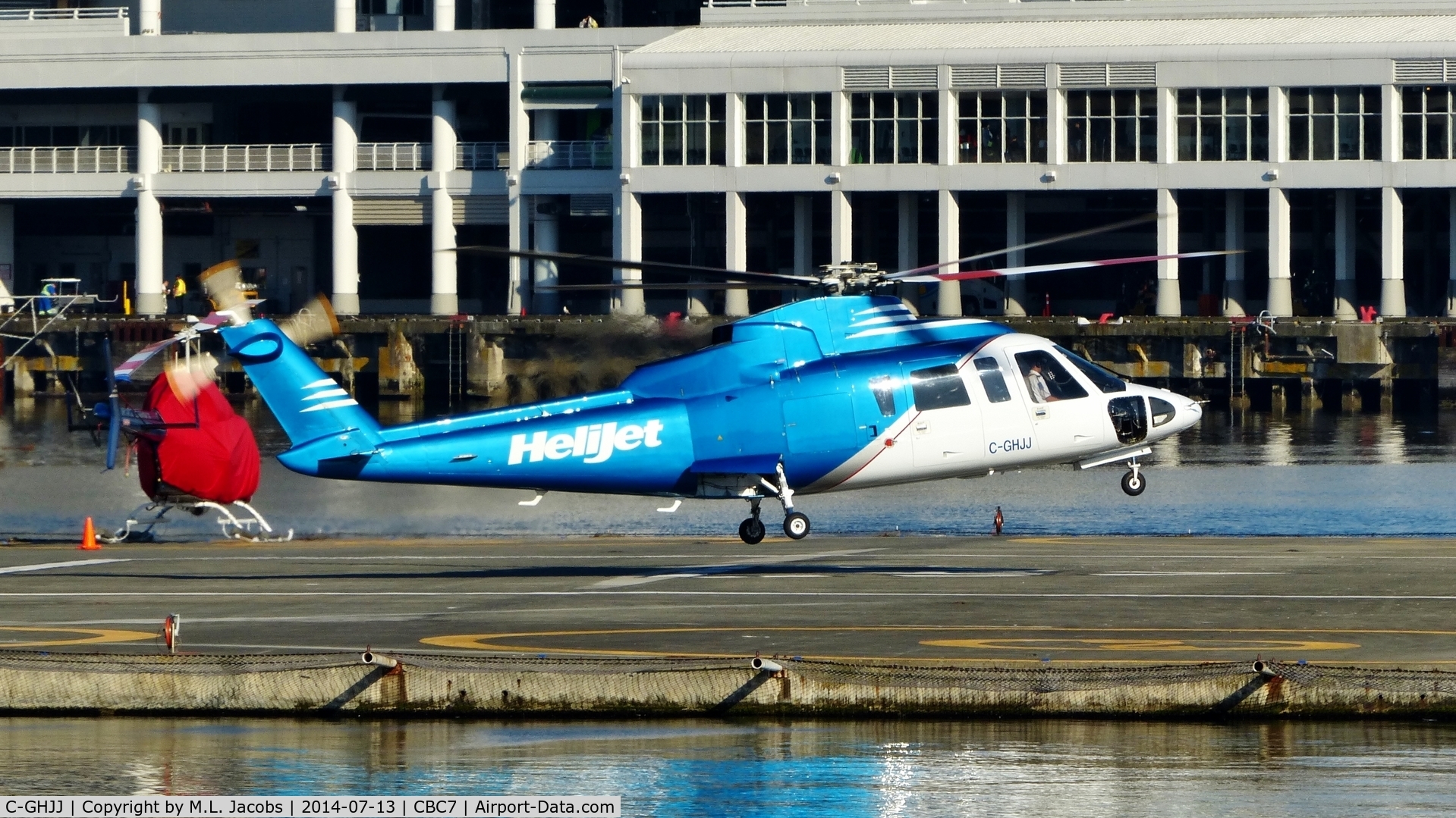C-GHJJ, 1984 Sikorsky S-76A C/N 760235, Helijet lifting off from Vancouver Harbour Heliport.