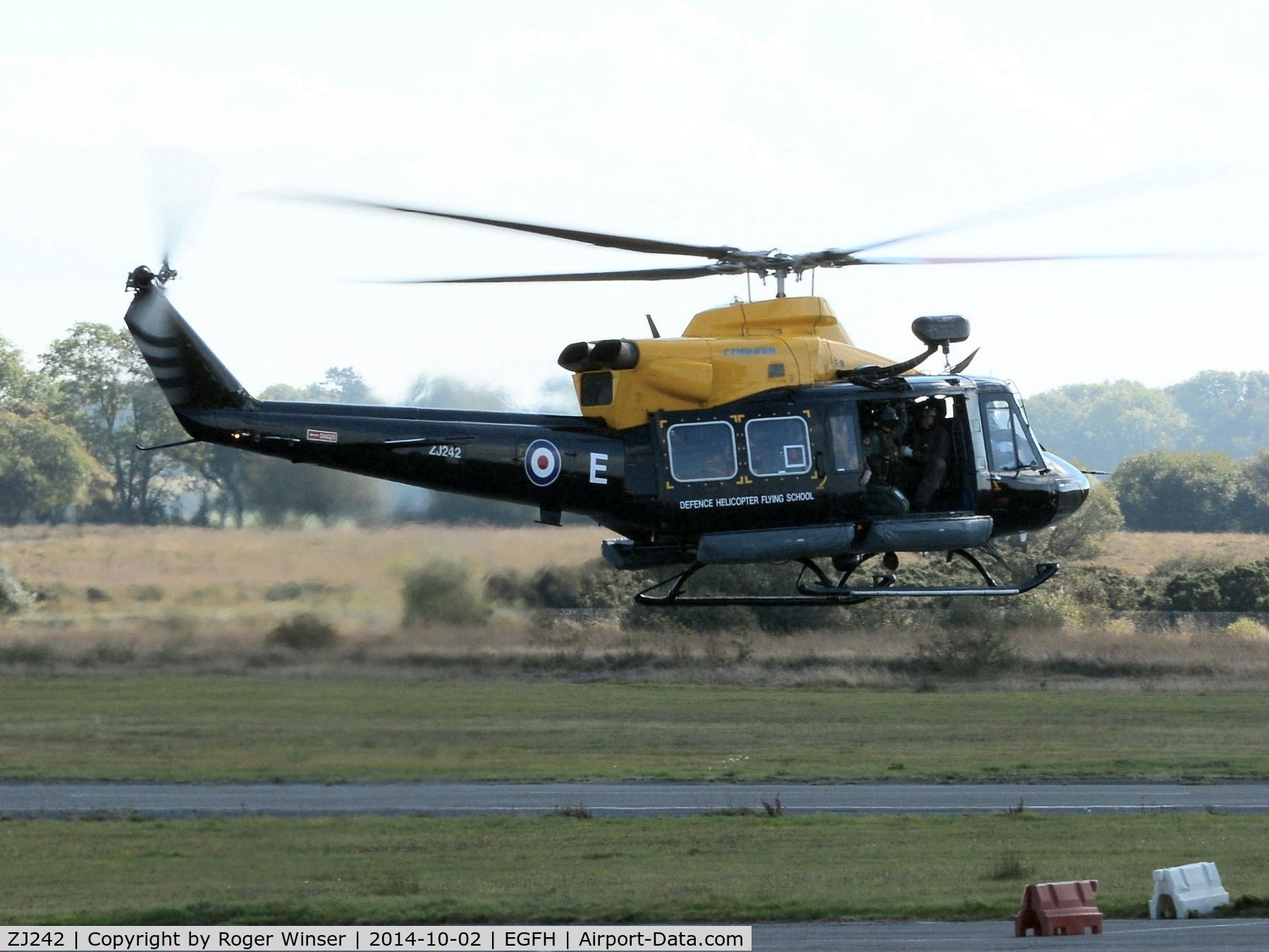 ZJ242, 1994 Bell 412EP Griffin HT1 C/N 36095, Vising Griffin helicopter coded E of 60 (R) squadron RAF departing.