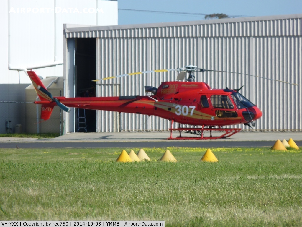 VH-YXX, 2003 Eurocopter AS-350B-3 Ecureuil Ecureuil C/N 3739, Eurocopter VH-XYY at Moorabbin 3 Oct 2014