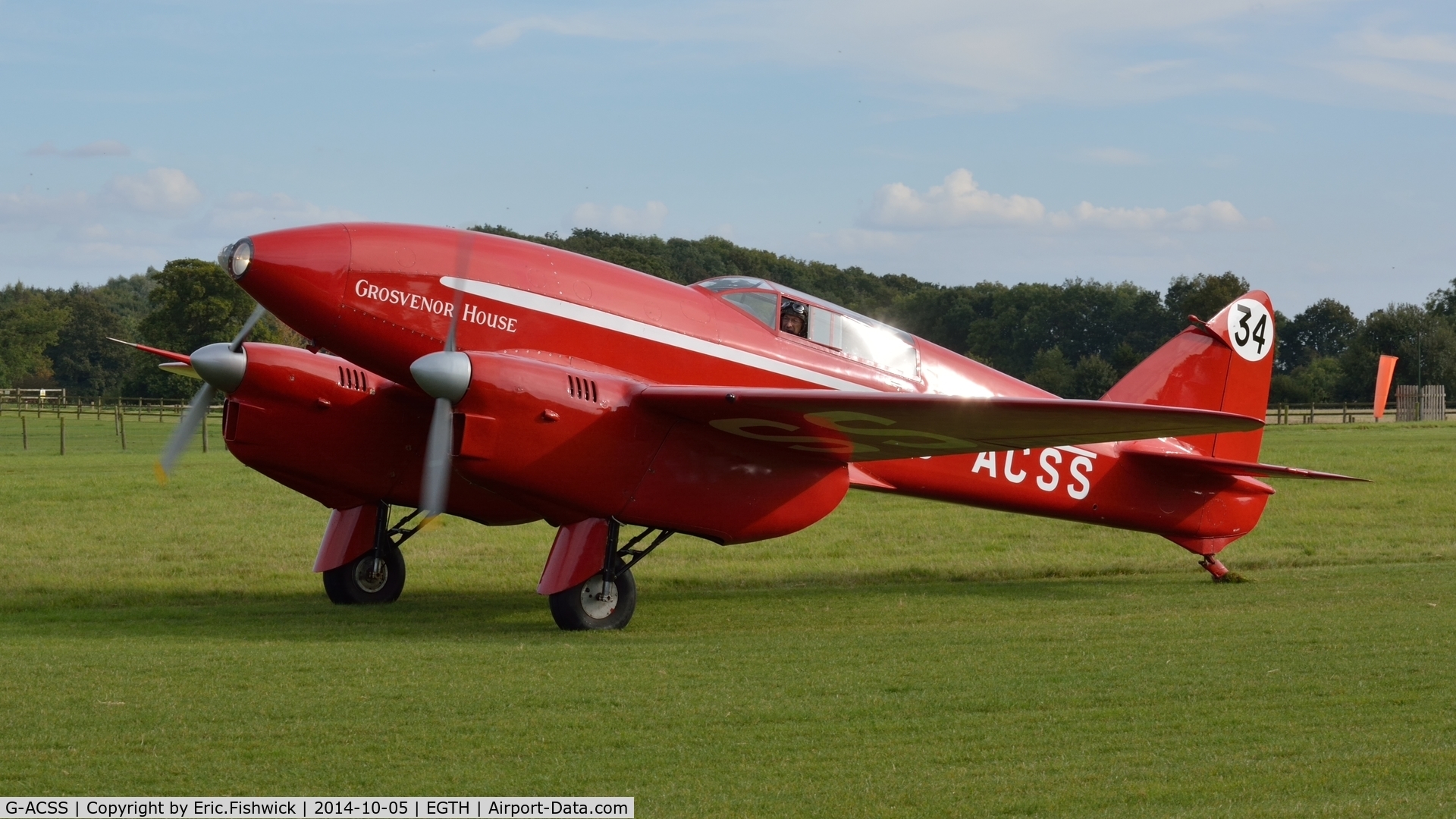 G-ACSS, 1934 De Havilland DH-88 Comet C/N 1996, 1. G-ACSS returning from an exhilarating display at the rousing season finale Race Day Air Show at Shuttleworth, Oct. 2014.