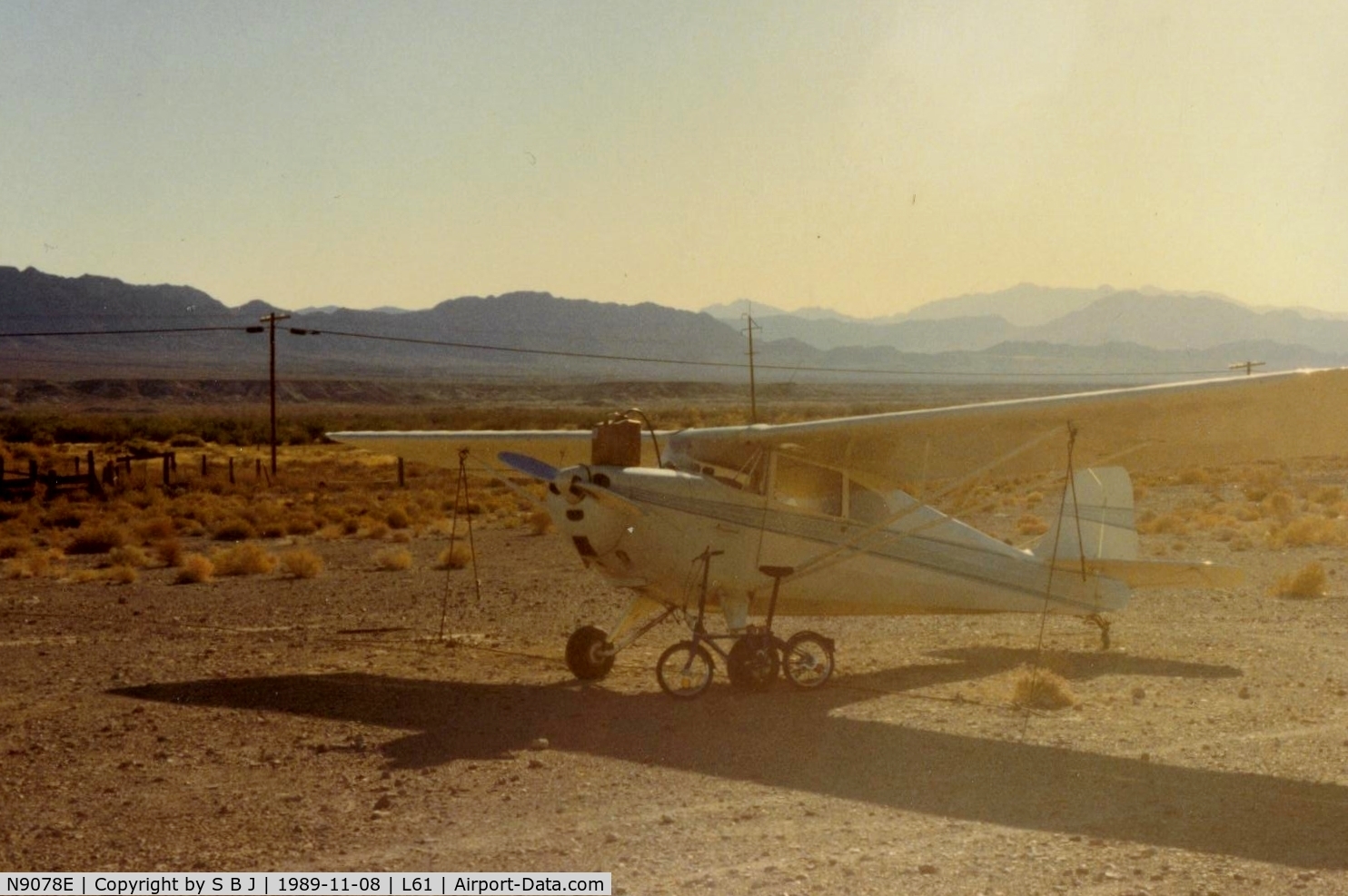N9078E, 1946 Aeronca 11AC Chief C/N 11AC-710, 78E being fueled.The usual procedure in the desert was a bike, gas can and a hose.
