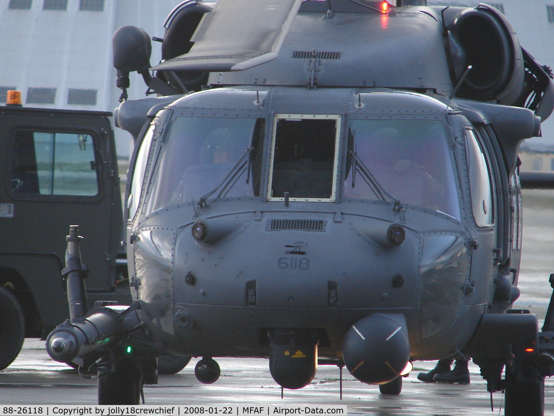 88-26118, 1988 Sikorsky HH-60G Pave Hawk C/N 70-1338, 18 being pushed into the hanger with crew onboard. Notice snoopy on the nose.