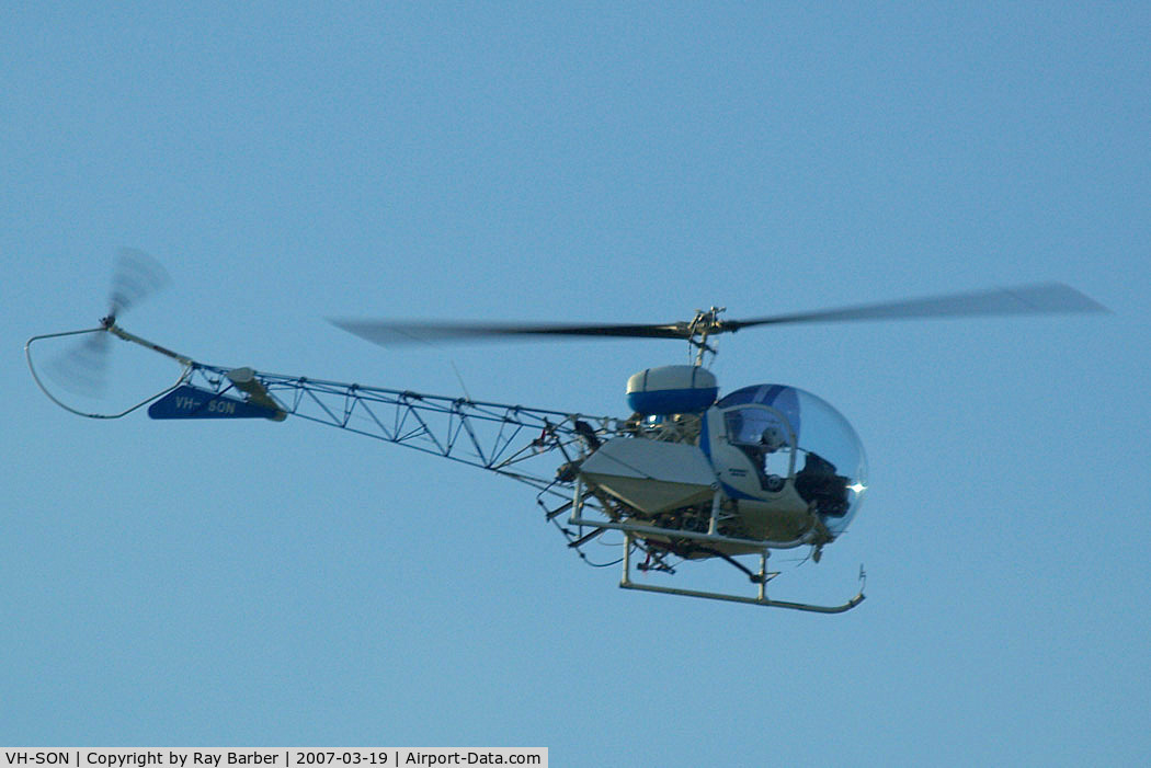 VH-SON, 1964 Bell 47G-4 C/N 3135, Bell 47G-4 Soloy [3135] Brisbane area~VH 19/03/2007. Taken through glass of moving coach whilst on the motorway.