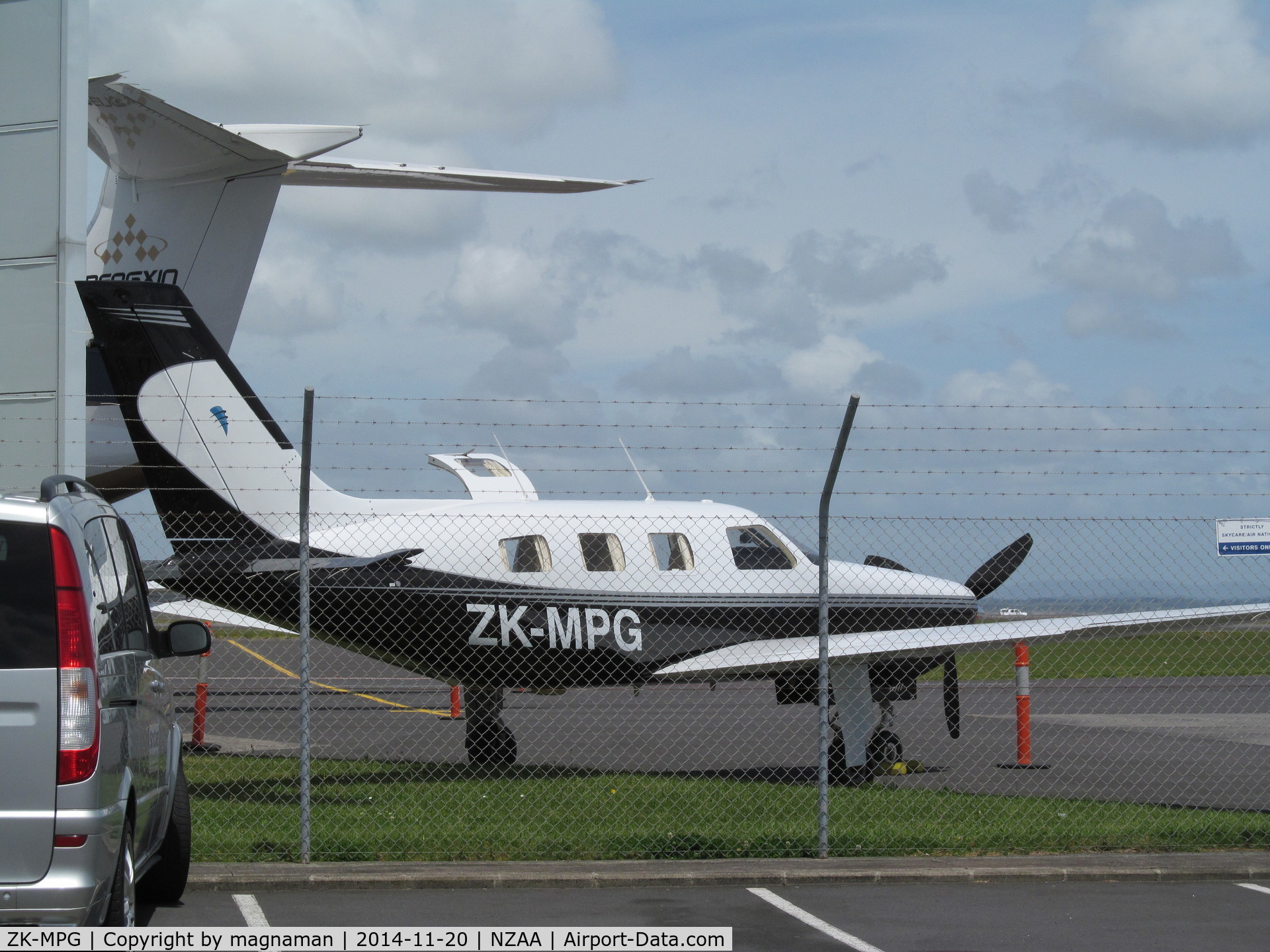 ZK-MPG, 1985 Piper PA-46-310P Malibu C/N 46-8508063, At corporate centre with N588PX G550 in background