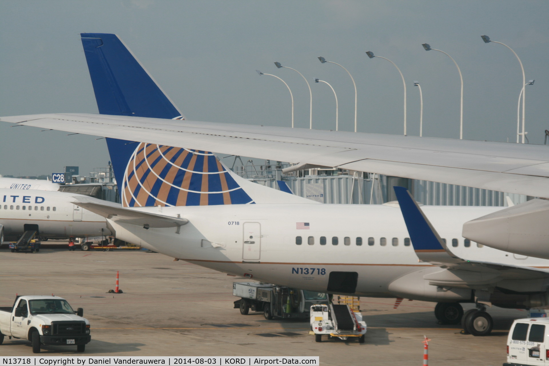 N13718, 1999 Boeing 737-724 C/N 28937, Parked at gate