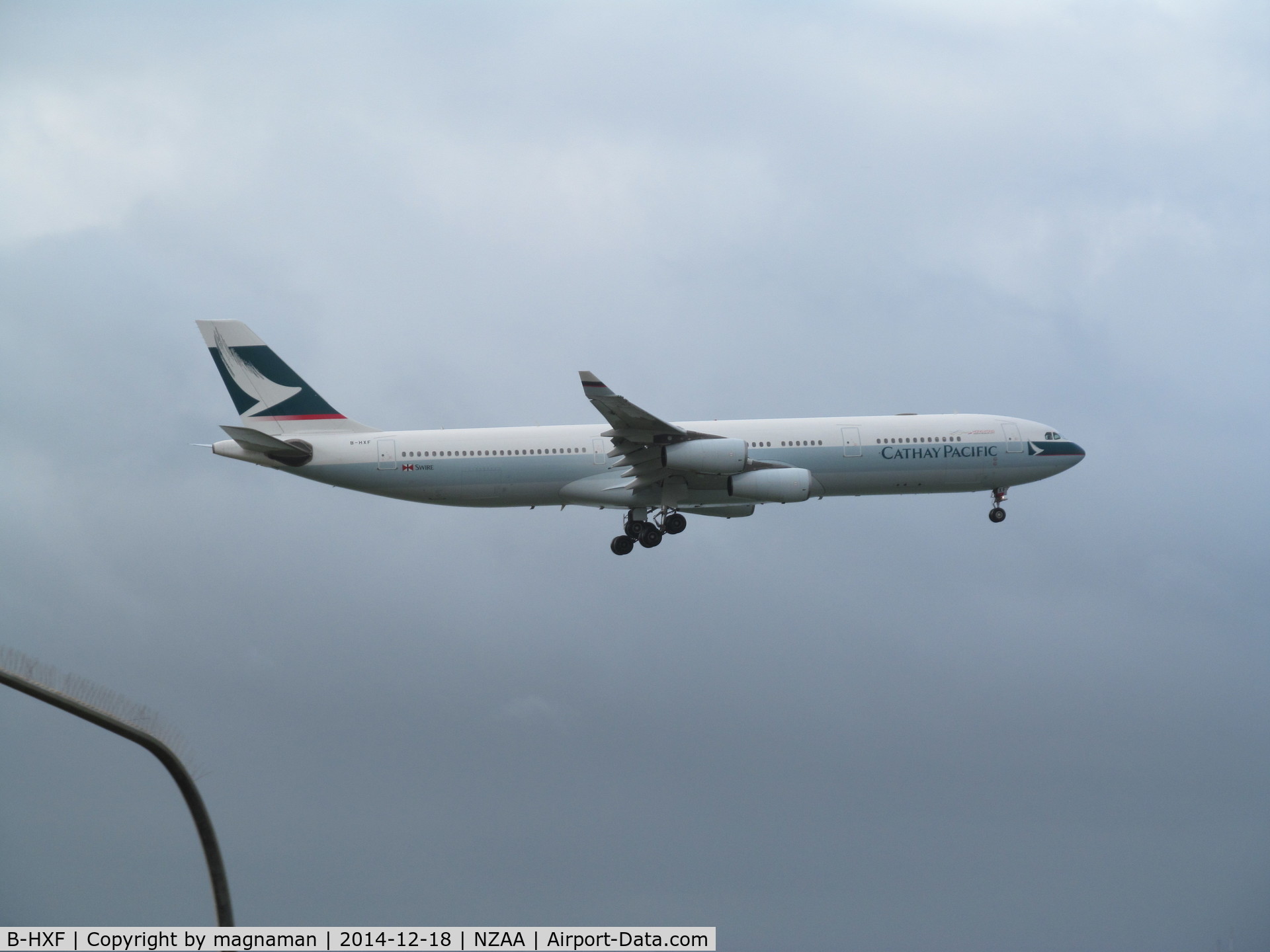 B-HXF, Airbus A340-313 C/N 160, landing at AKL - lots of street lamps to try and avoid!!