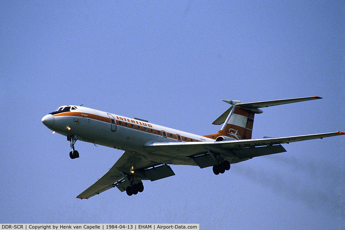 DDR-SCR, 1974 Tupolev Tu-134A C/N 4352206, Interflug Tu-134 in smoky approach to Schiphol airport, the Netherlands
