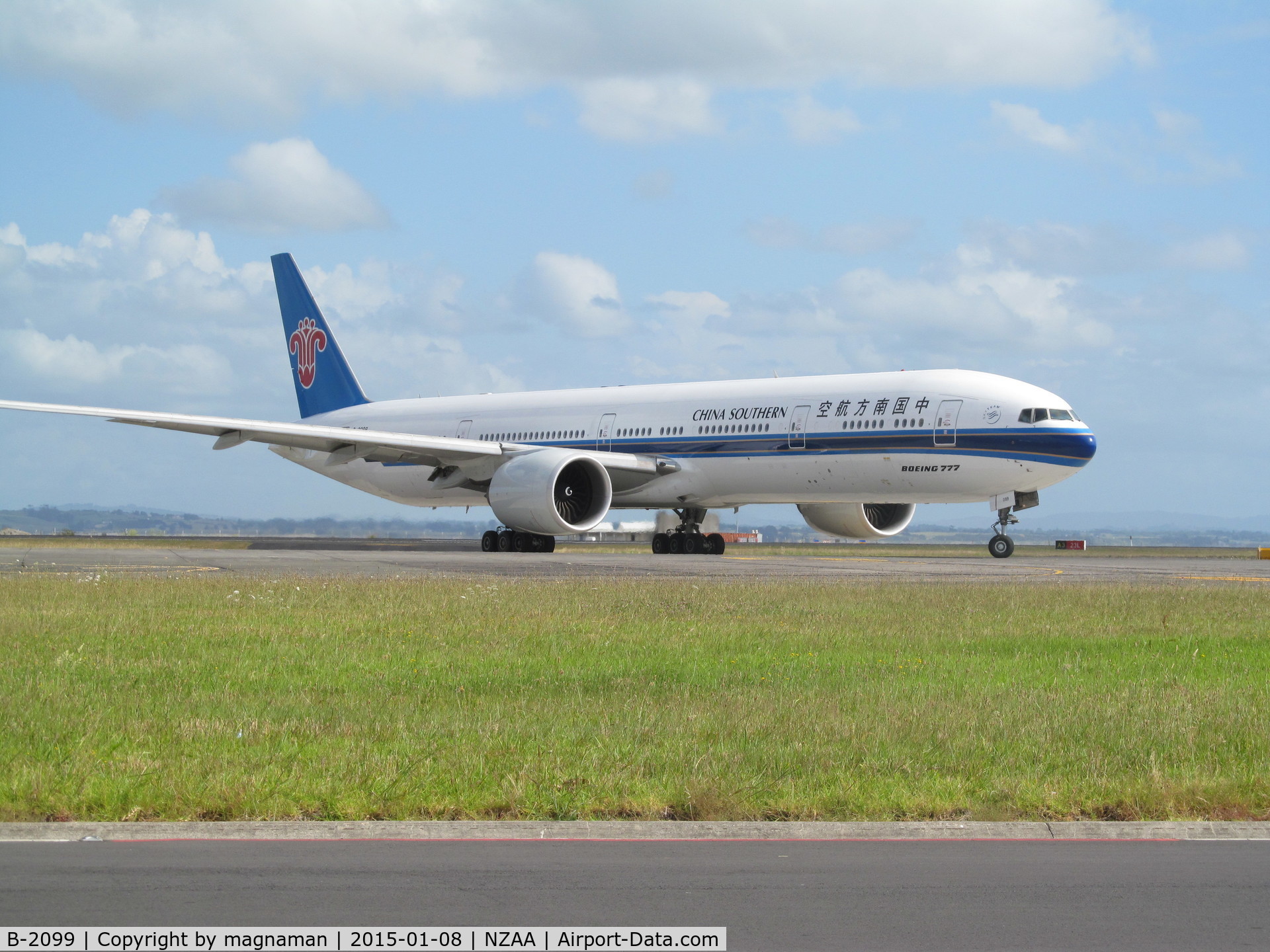 B-2099, 2014 Boeing 777-31B/ER C/N 43219, turning off runway