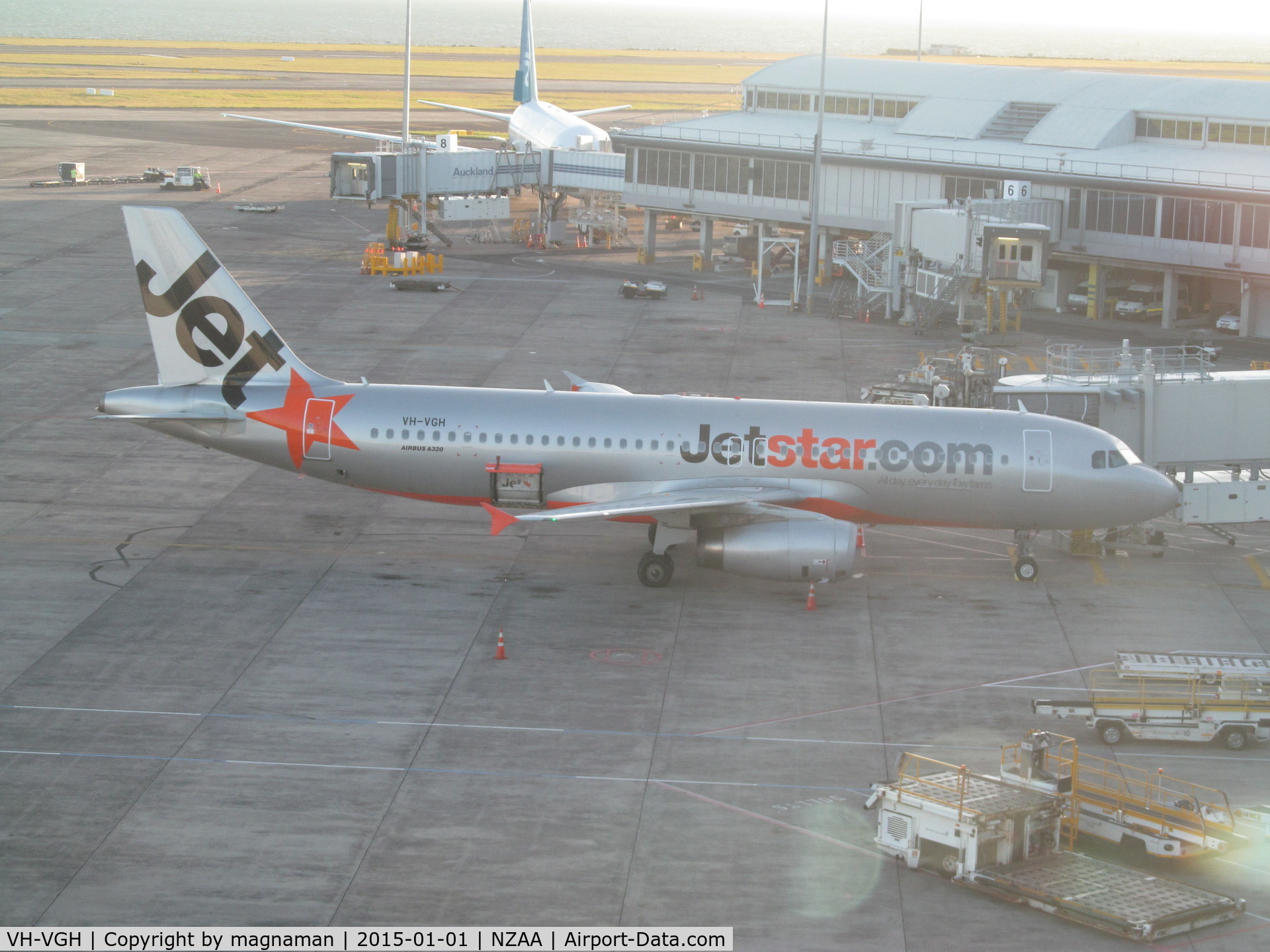 VH-VGH, 2010 Airbus A320-232 C/N 4495, on apron - strong sun and glass in viewing area not helping!