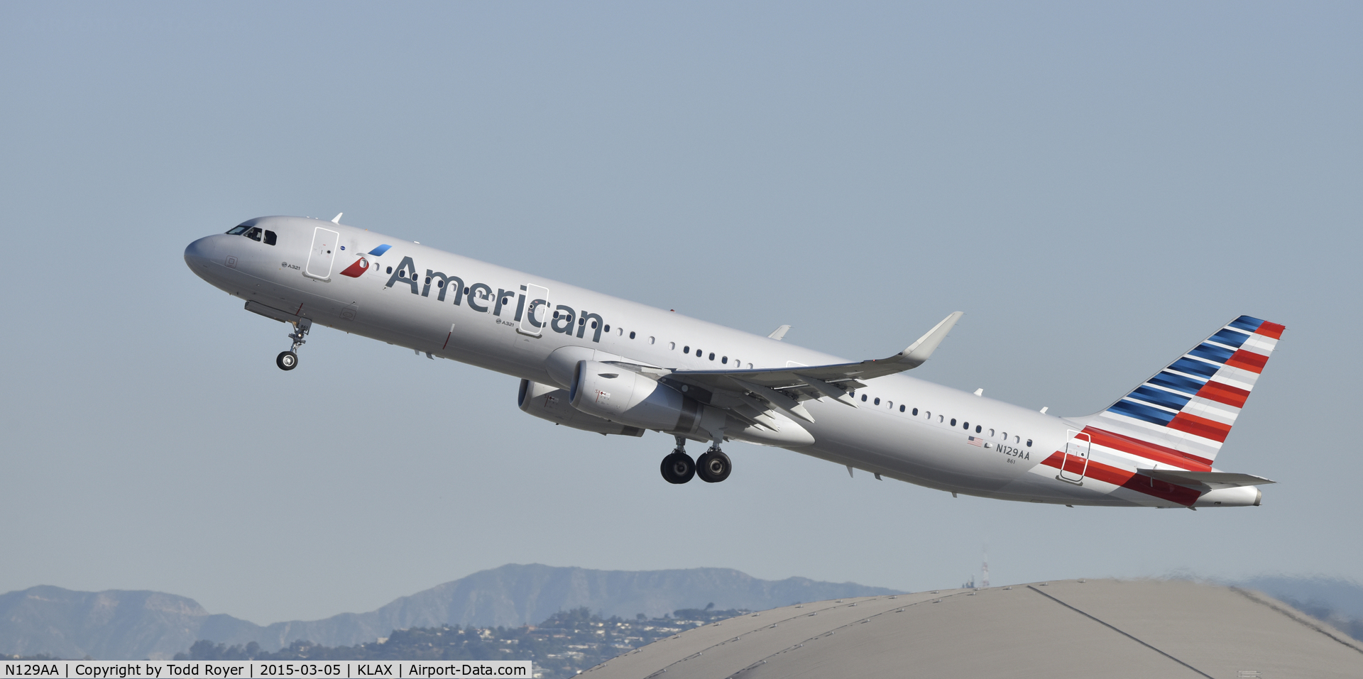 N129AA, 2014 Airbus A321-231 C/N 6401, Departing LAX on 25R