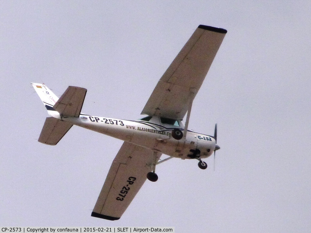 CP-2573, 1977 Cessna 152 C/N 15280529, Flying over Santa Cruz city