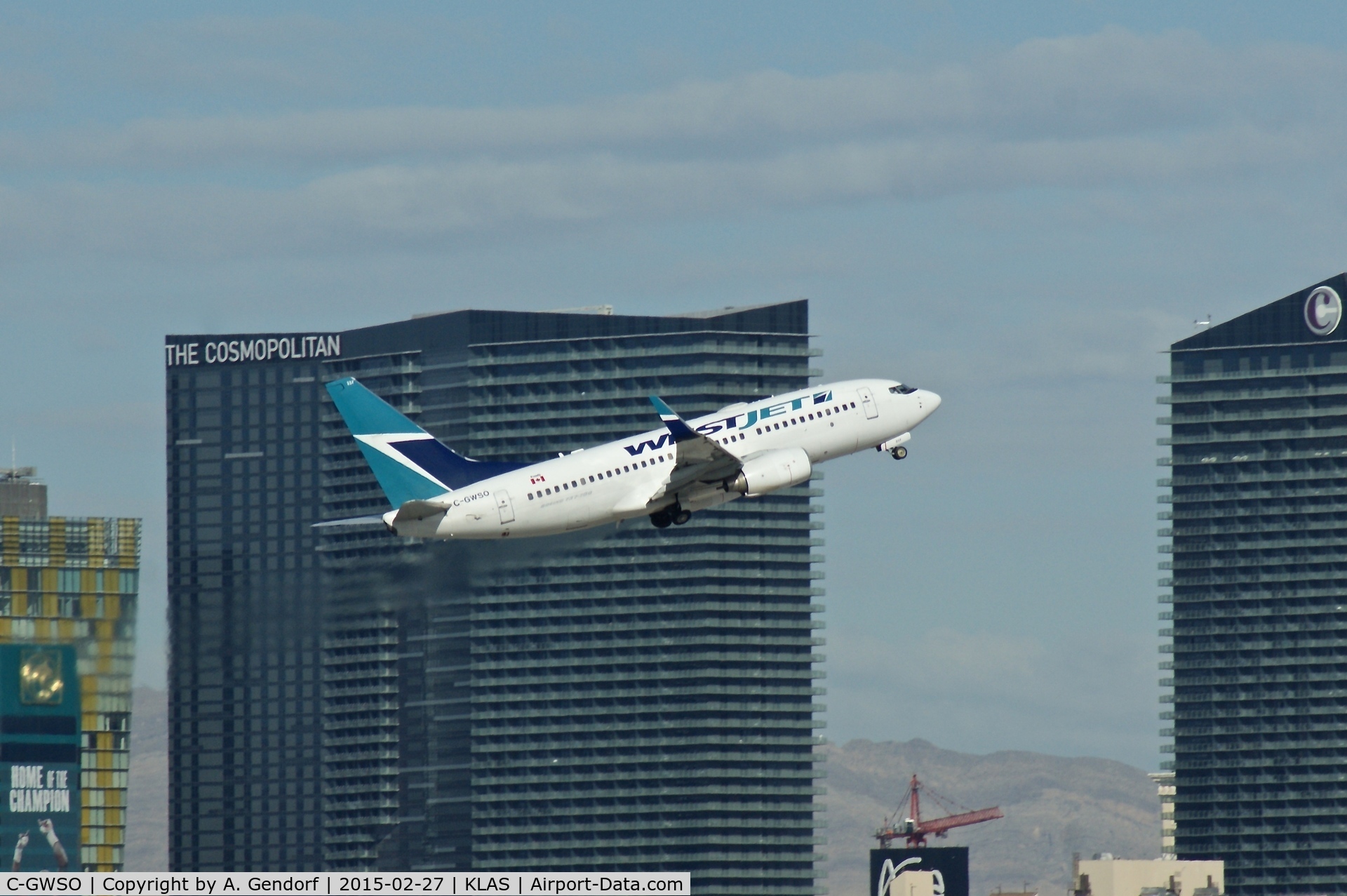 C-GWSO, 2009 Boeing 737-7CT C/N 37090, WestJet Airlines, is here climbing out Las Vegas Int'l(KLAS) with the Cosmopolitan Hotel in the background