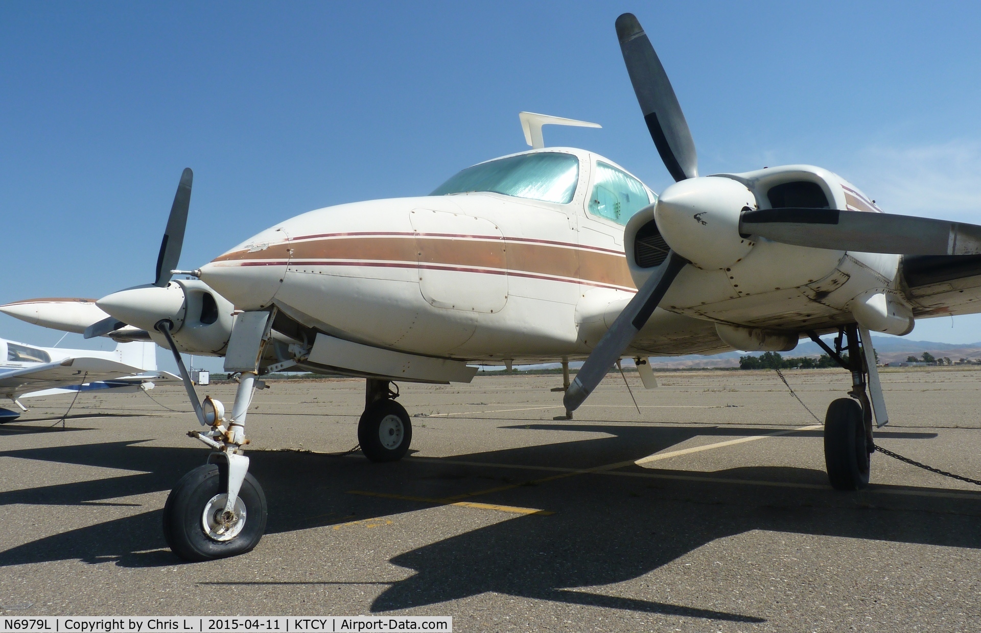 N6979L, 1966 Cessna 310K C/N 310K0079, A local 1966 Cessna 310K sitting on the ramp at Tracy Municipal Airport. This is 1 of the 3 twin engines sitting on the Tracy ramp.