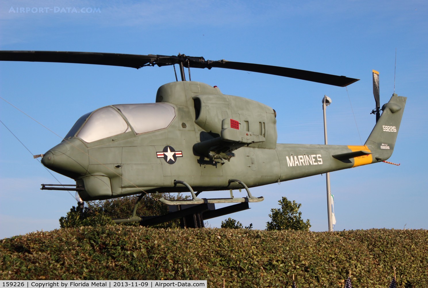 159226, Bell AH-1J Sea Cobra C/N 26066, AH-1 Sea Cobra at Memorial wall in Pensacola FL