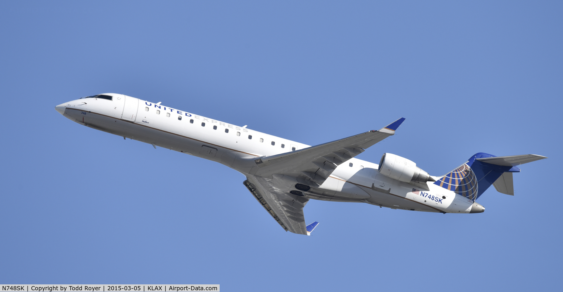 N748SK, 2005 Bombardier CRJ-700 (CL-600-2C10) Regional Jet C/N 10203, Departing LAX on 25R